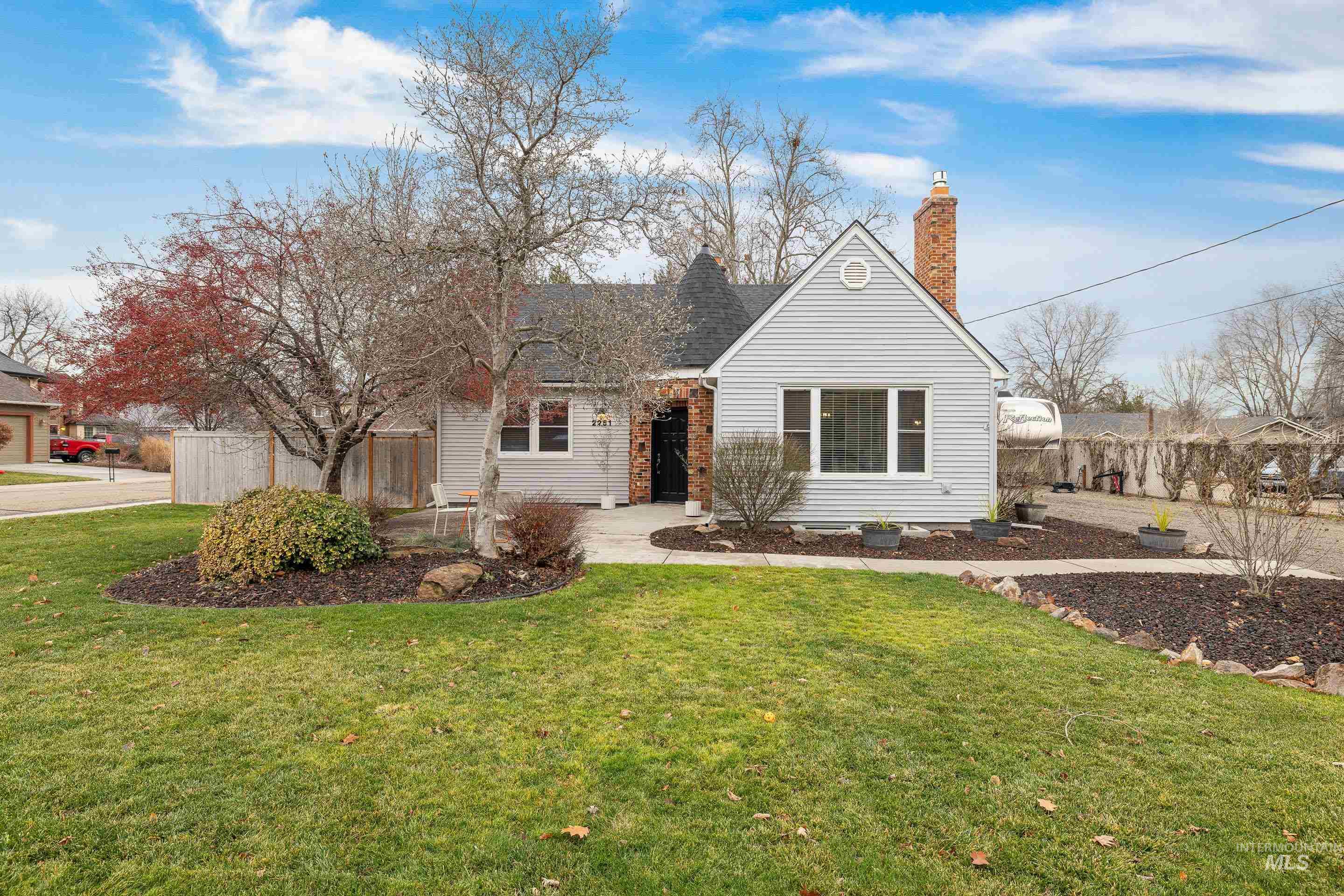 View of front of home with a chimney