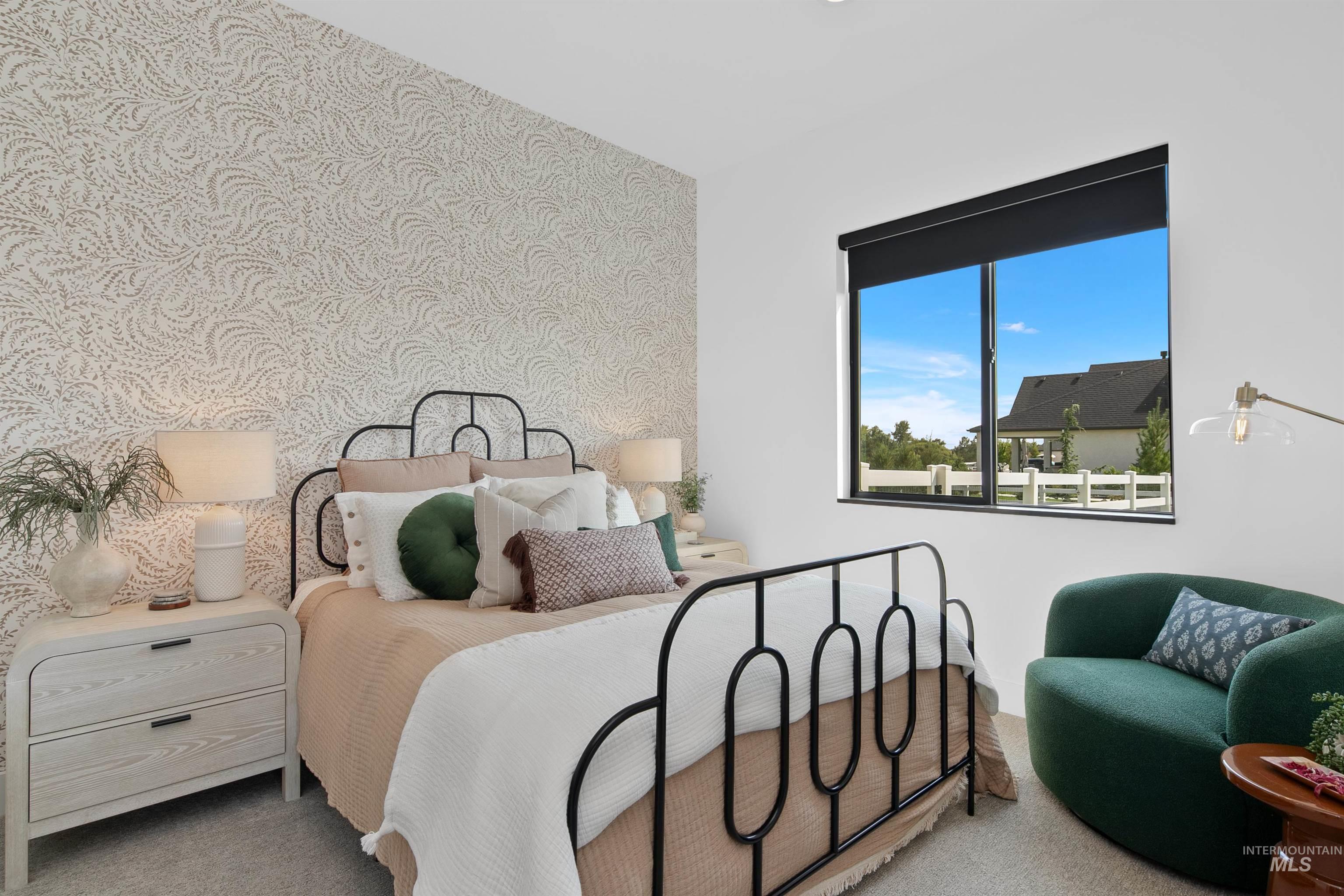 Bedroom with carpet flooring and wallpapered walls