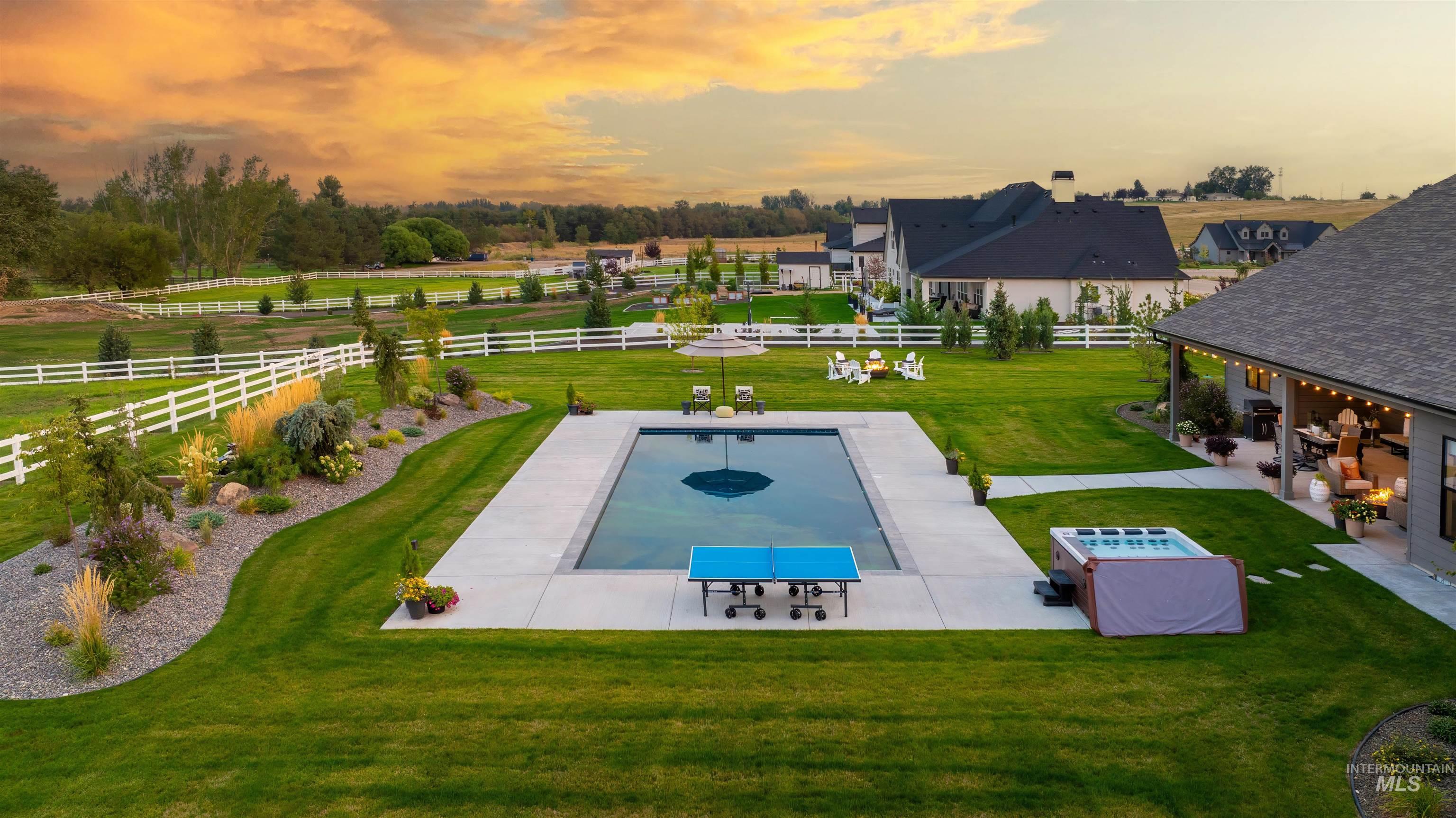 Exterior space with a patio area and a view of countryside