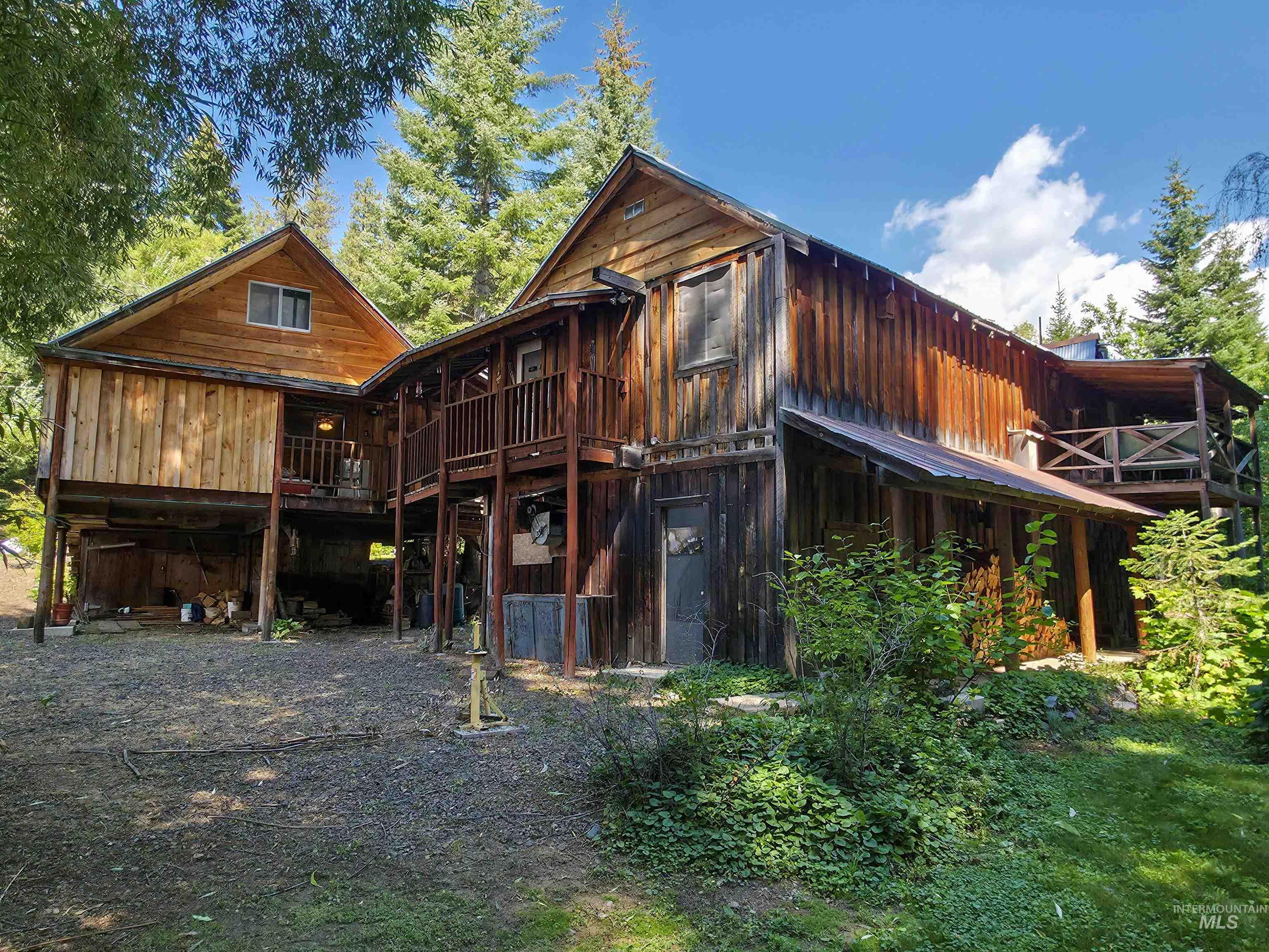 Rear view of property with a deck