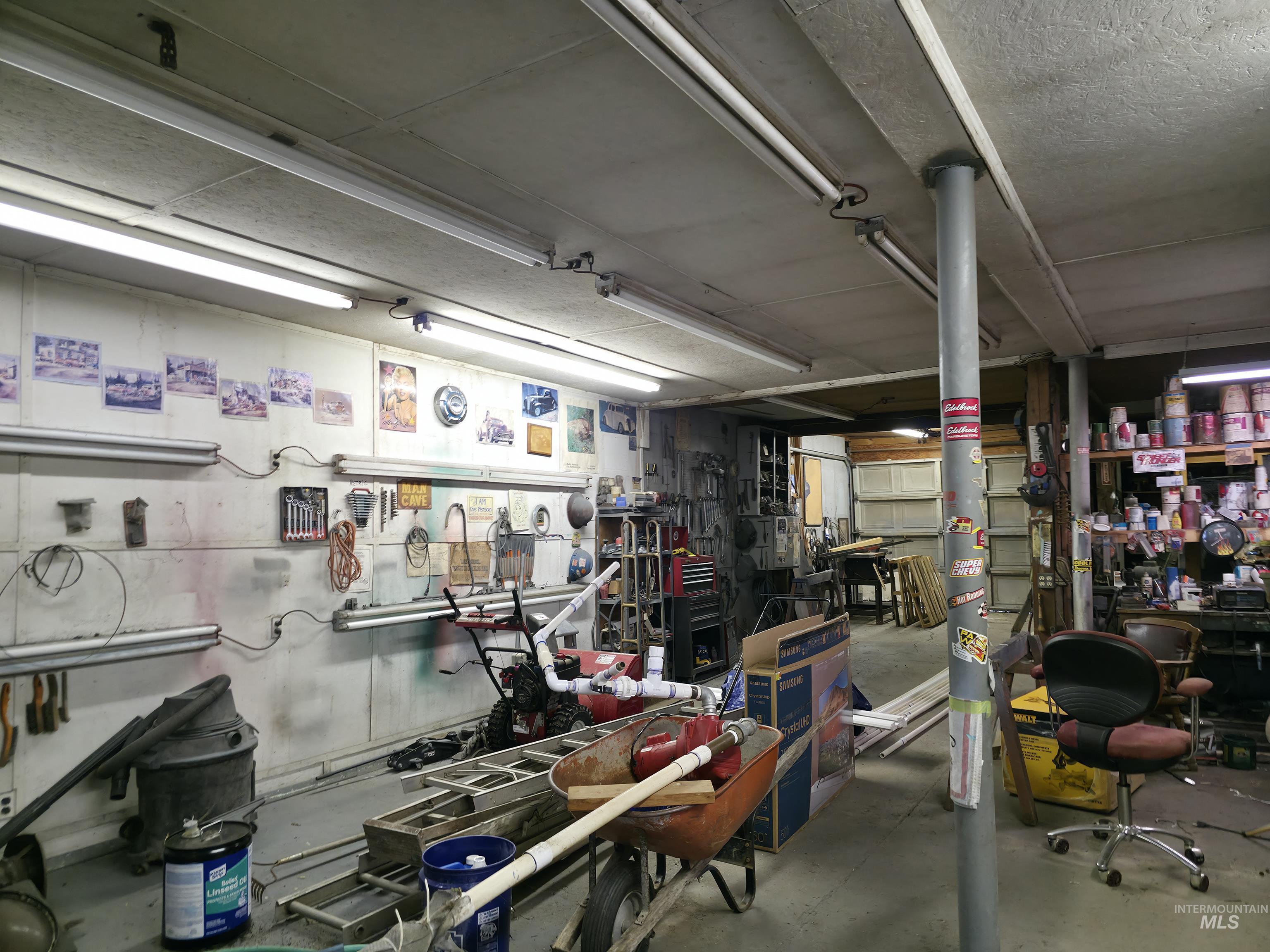 Garage featuring a workshop area