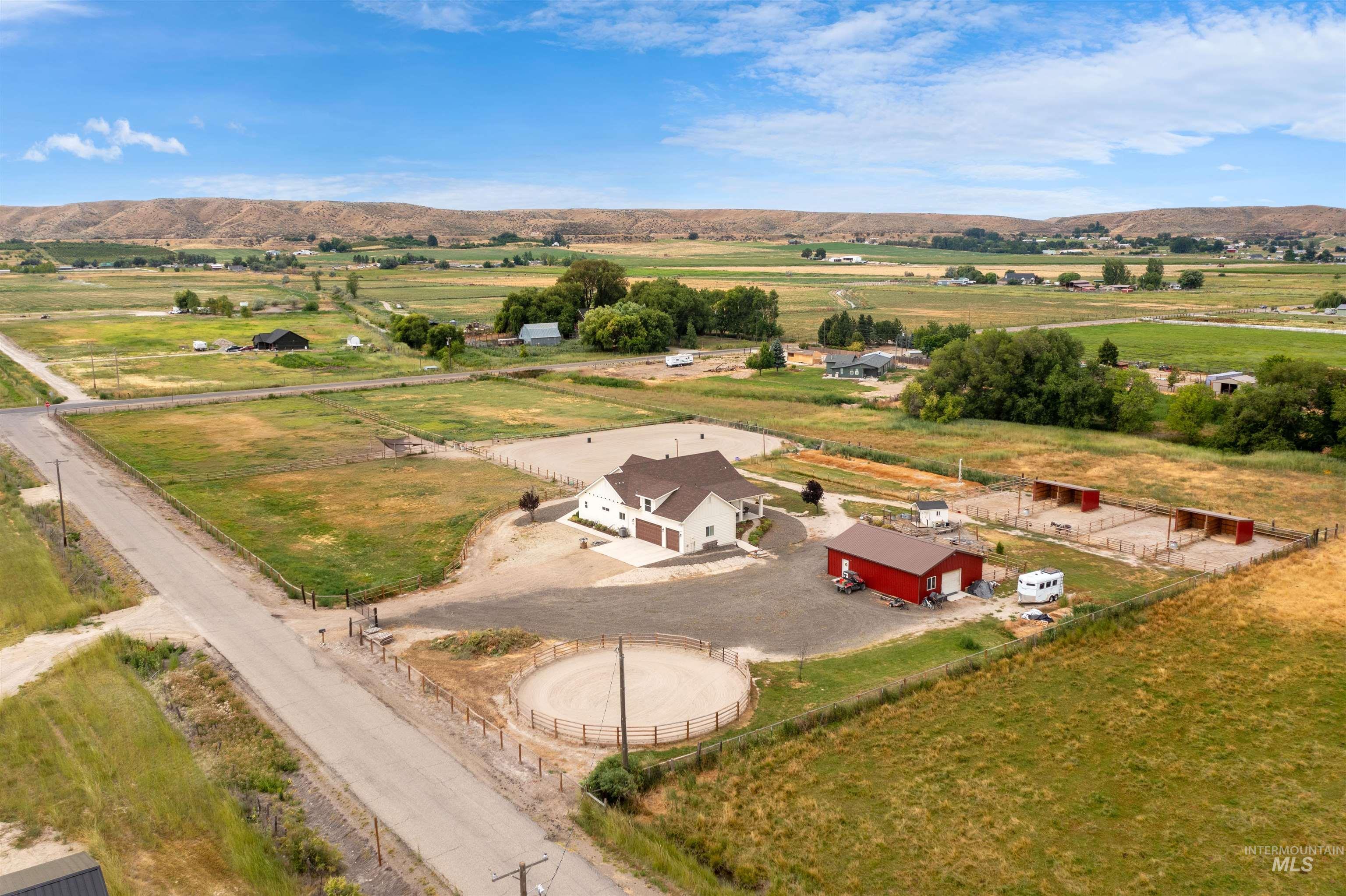 Overview of rural landscape featuring a mountain backdrop