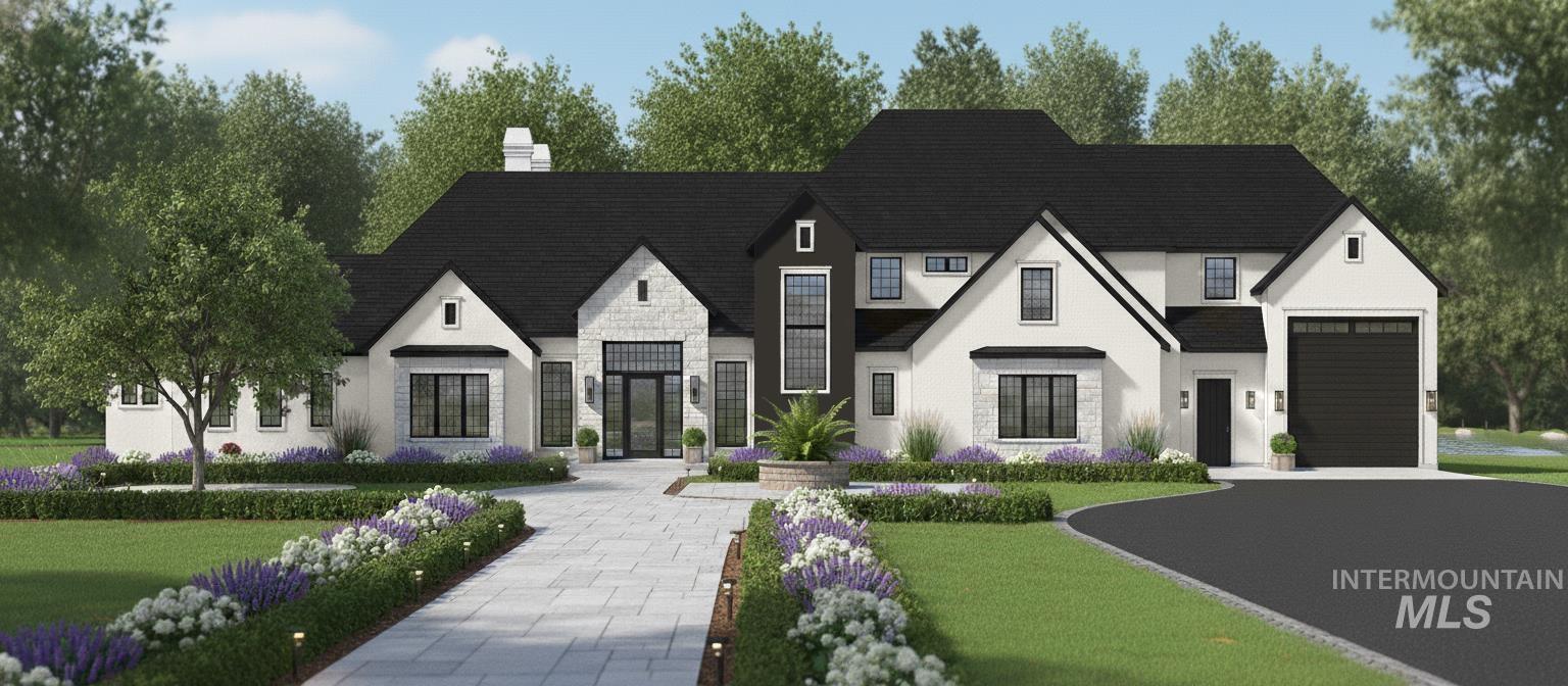 View of front of home featuring stone siding, a chimney, driveway, and a front yard