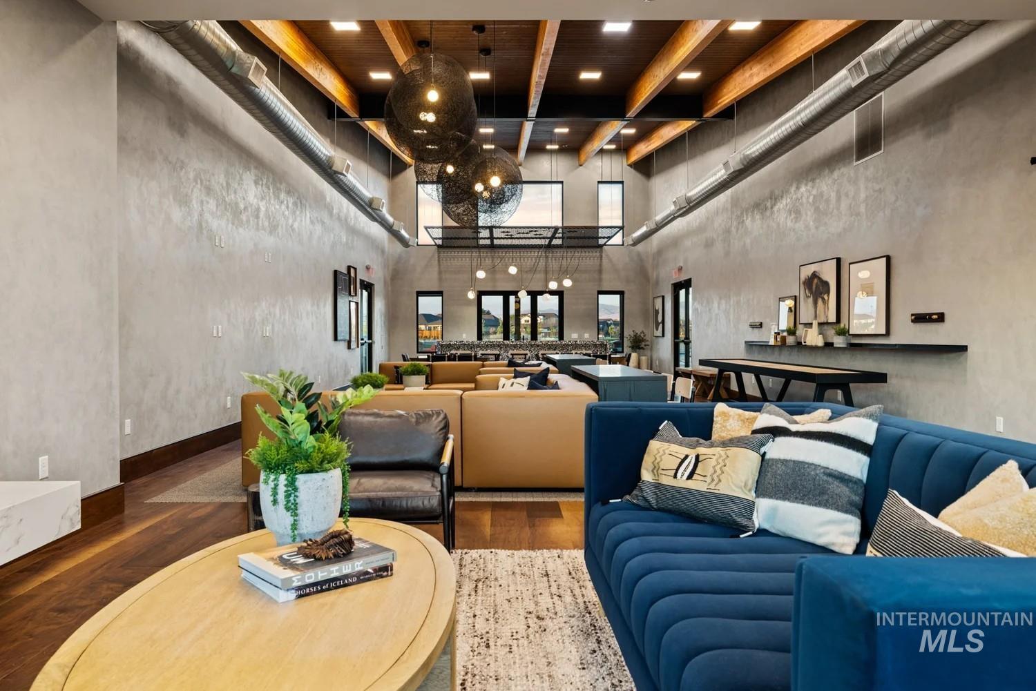 Lobby with a high ceiling and beamed ceiling