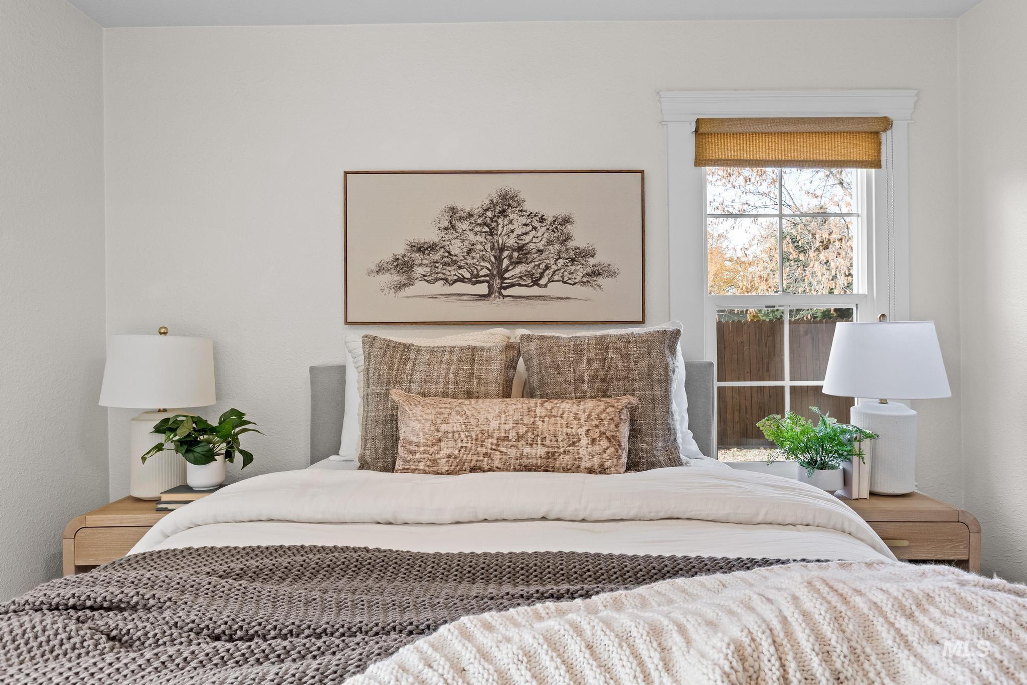 Bedroom featuring a textured wall