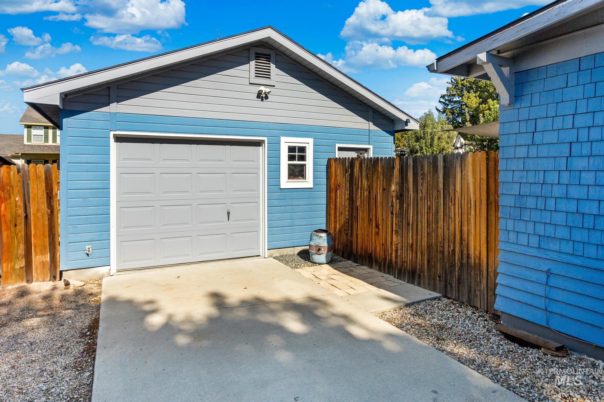 Detached garage with driveway
