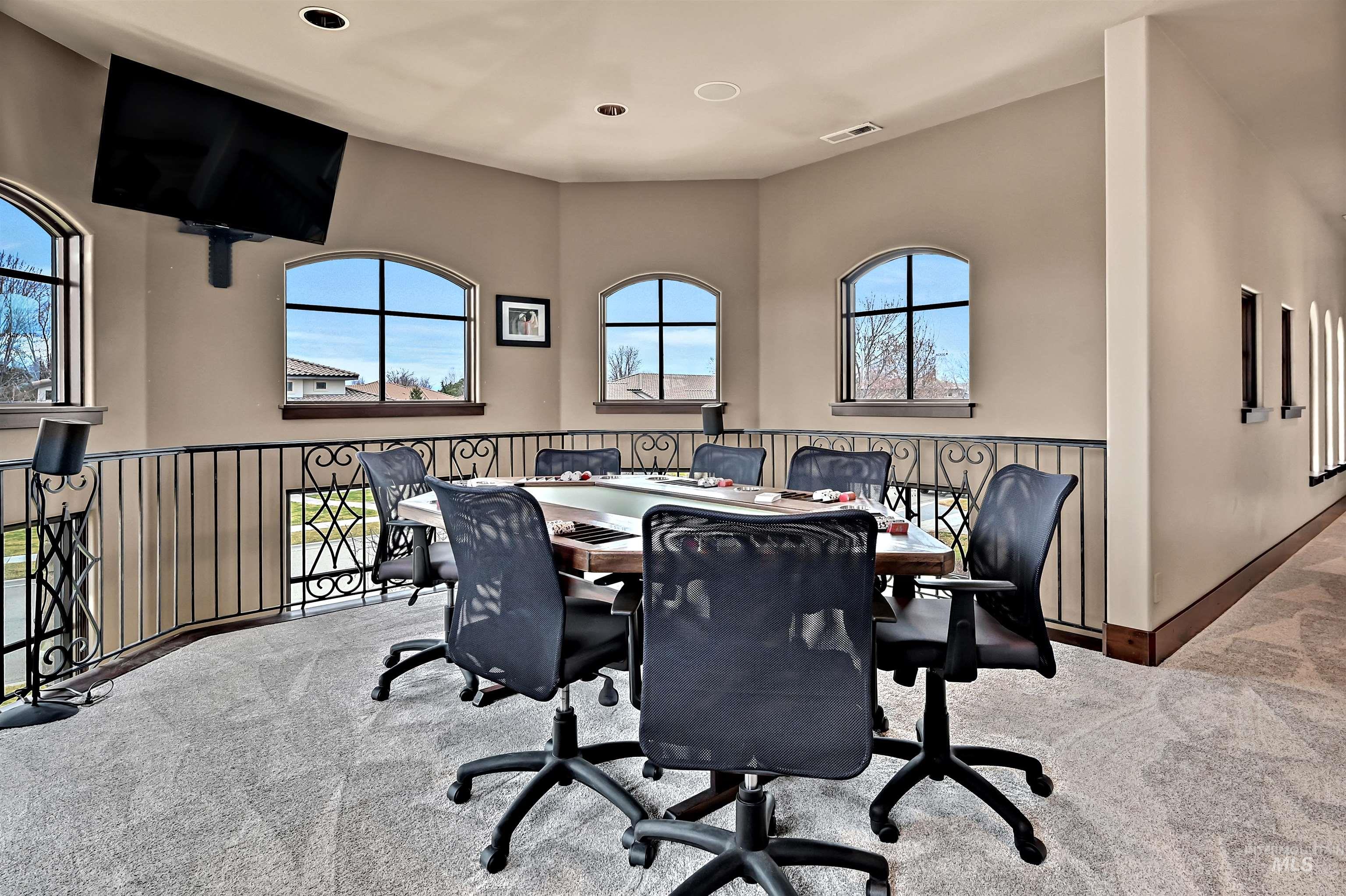 Office area with carpet flooring