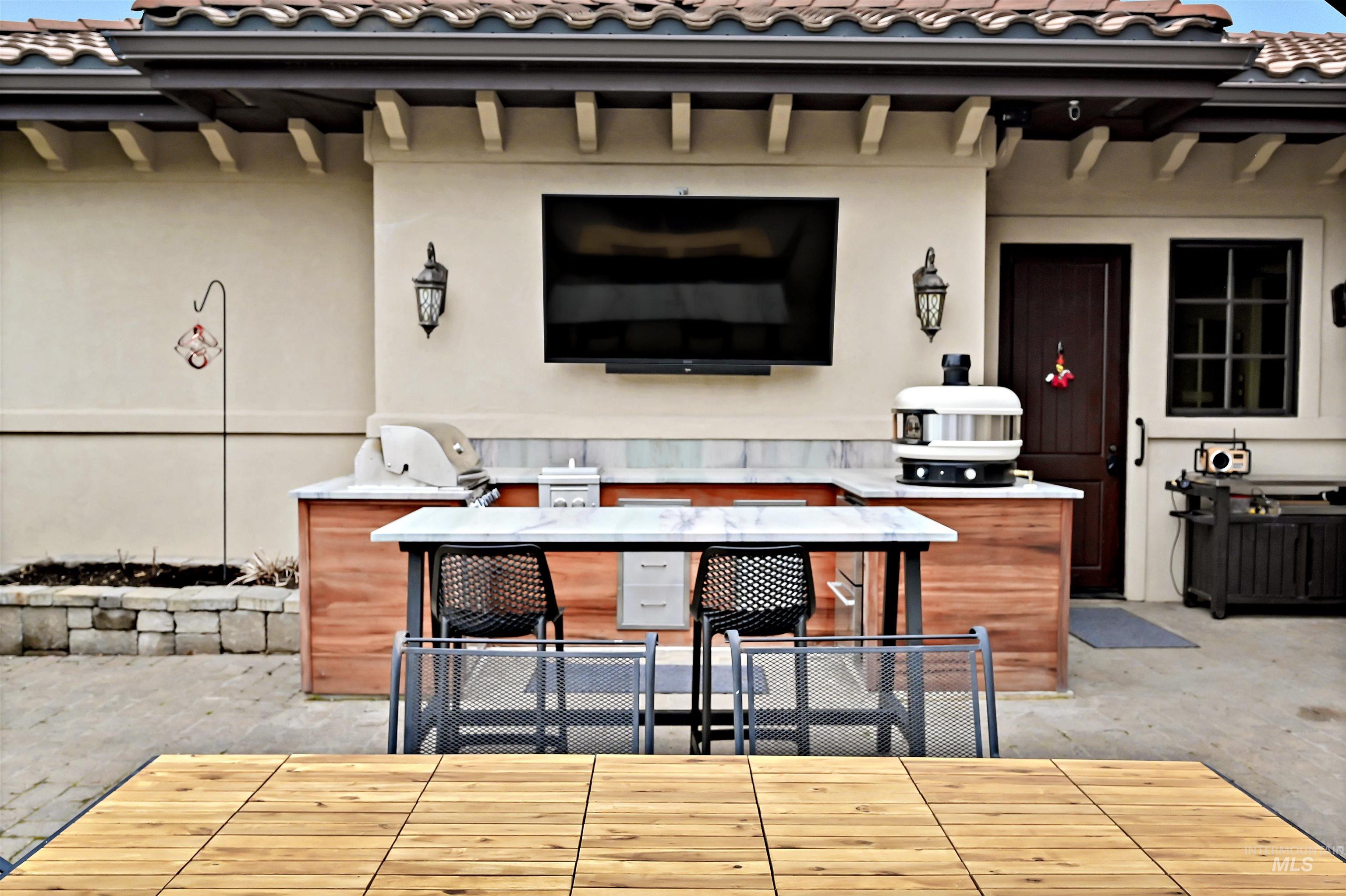 View of patio / terrace featuring exterior kitchen