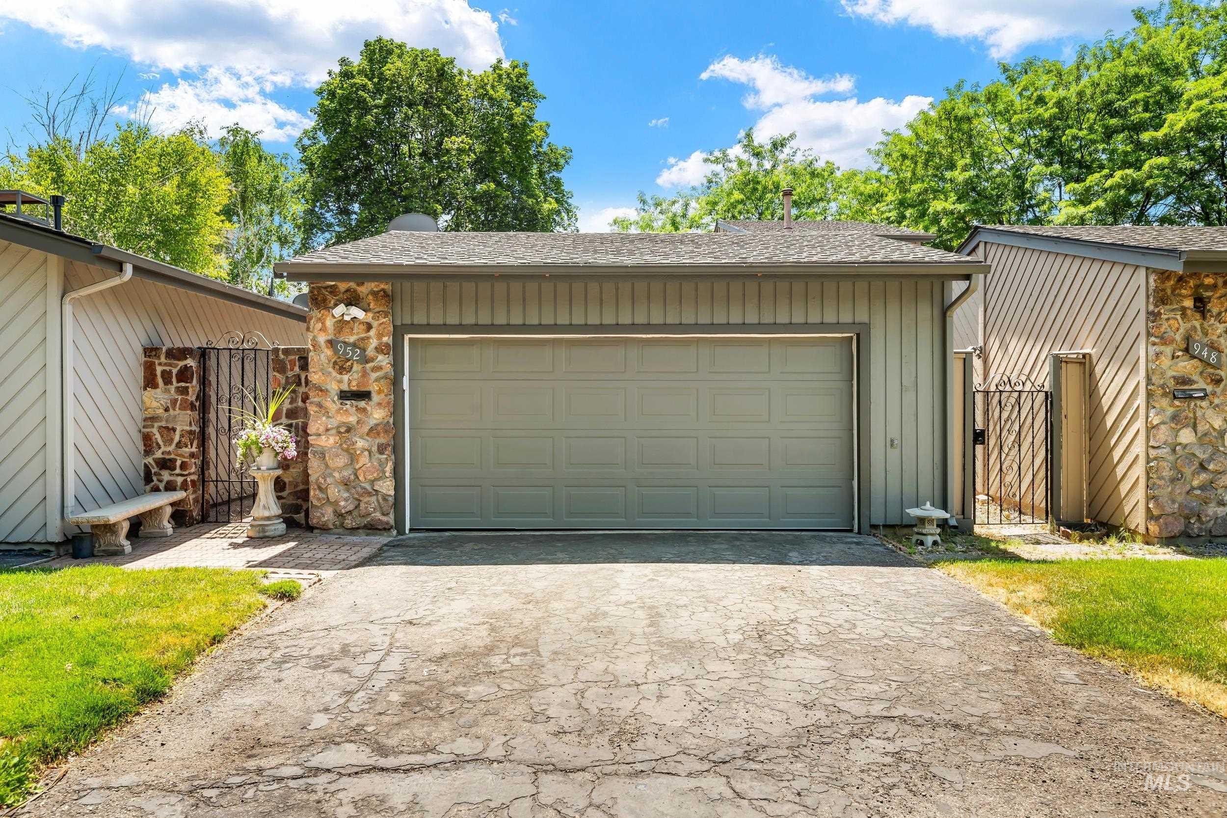 Garage featuring driveway