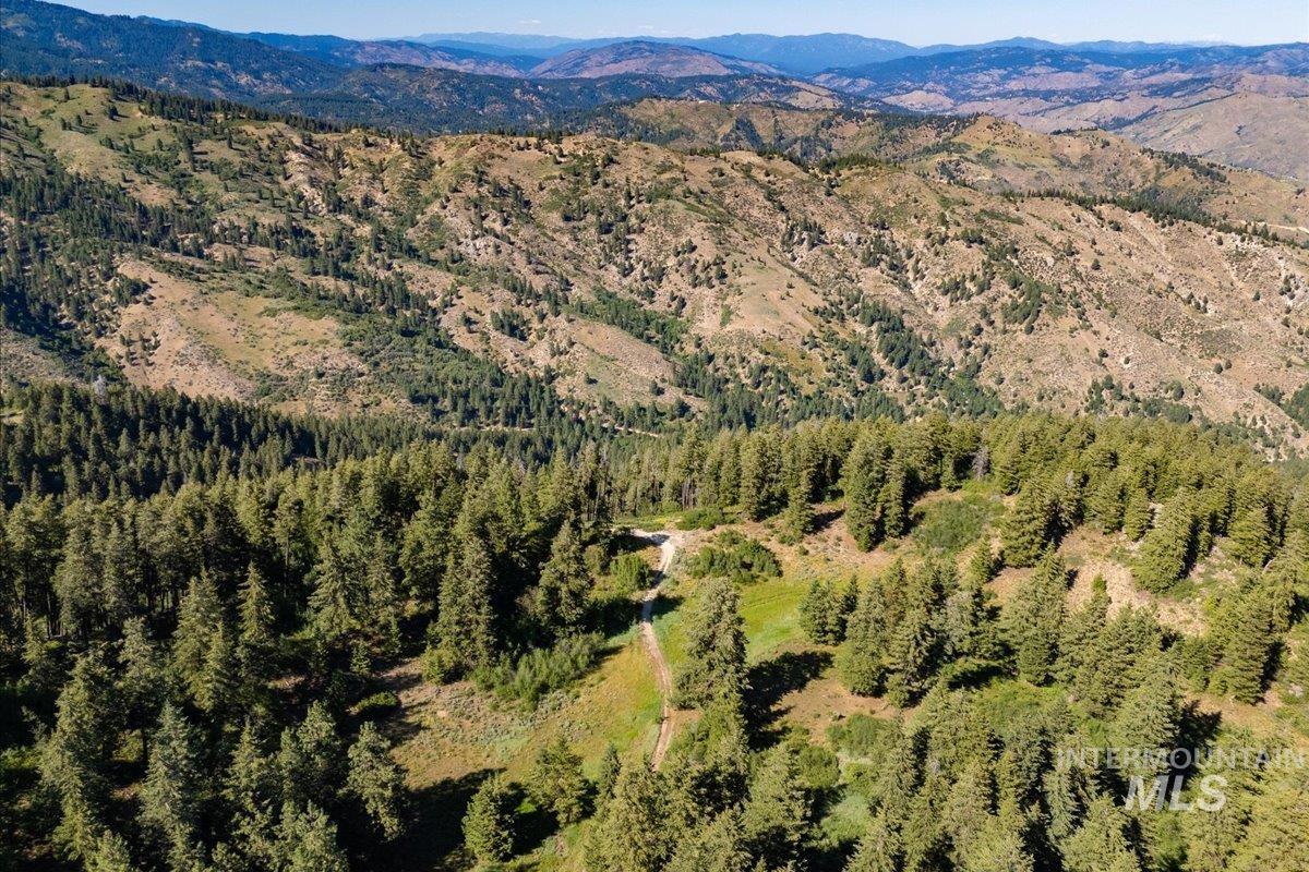 Drone / aerial view of a mountain backdrop