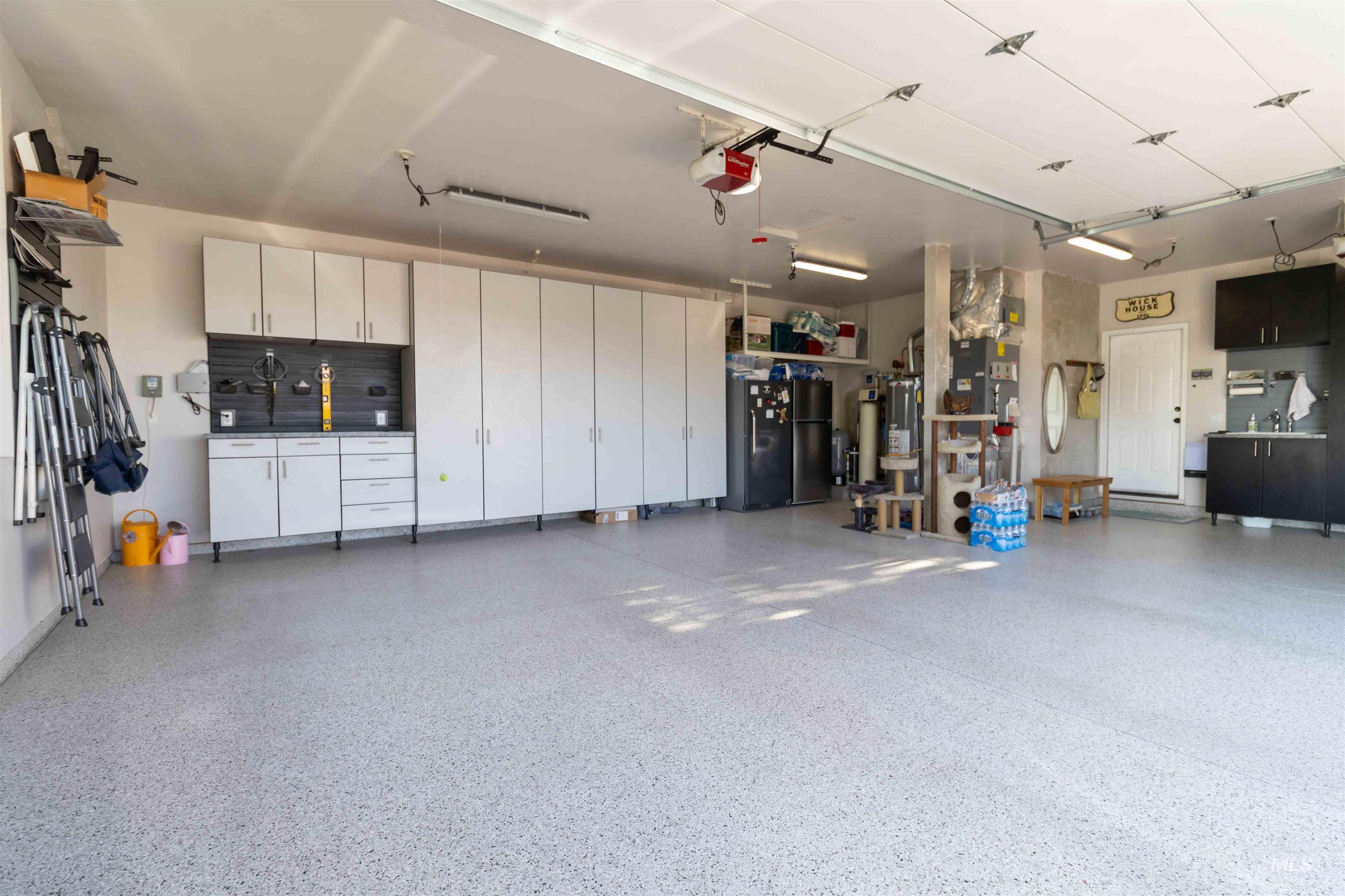 23? deep, epoxy flooring & custom cabinets