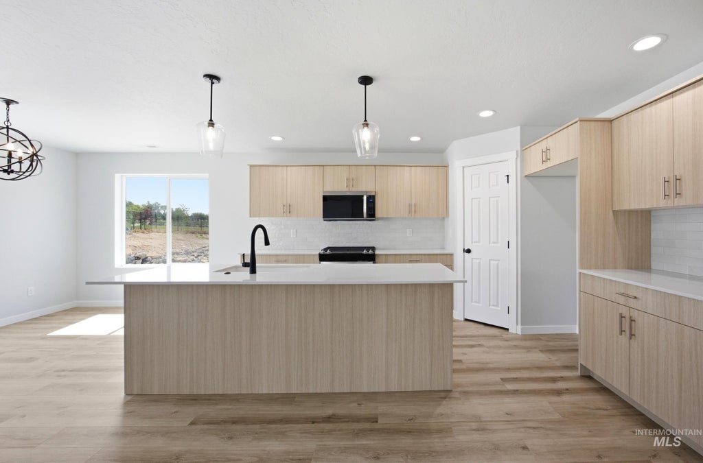 Photo of 9401 W Blazing Star St, Nampa, ID 83687 (MLS # 99000955)