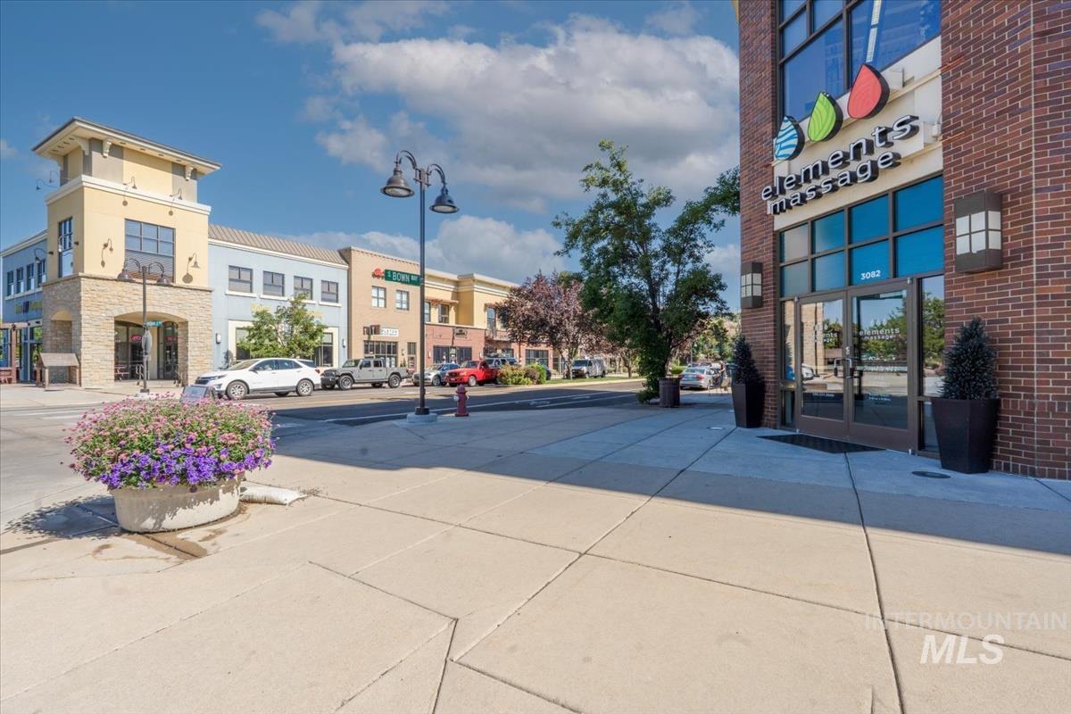 View of street with sidewalks, street lights, and curbs