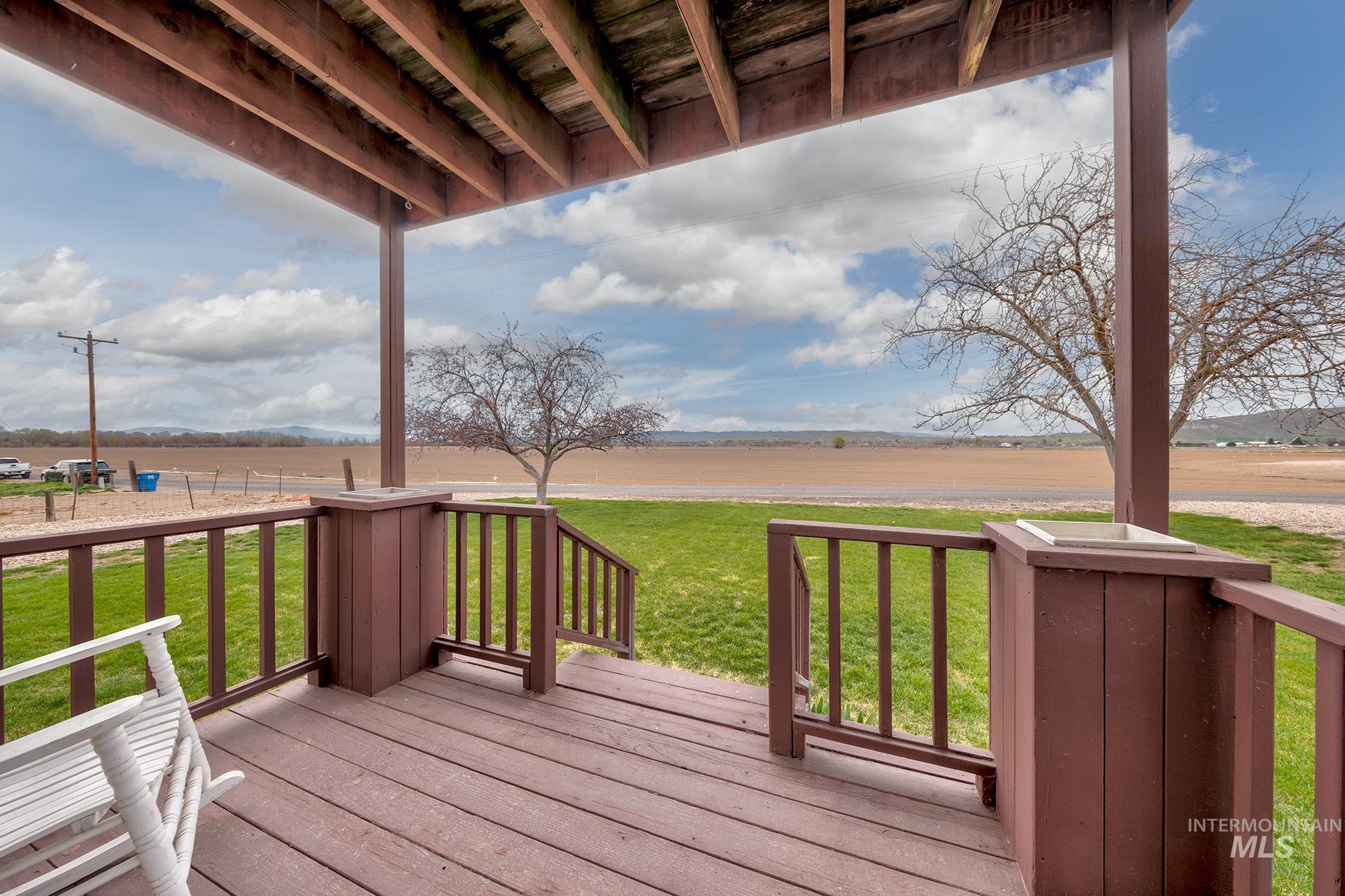 Deck featuring a lawn