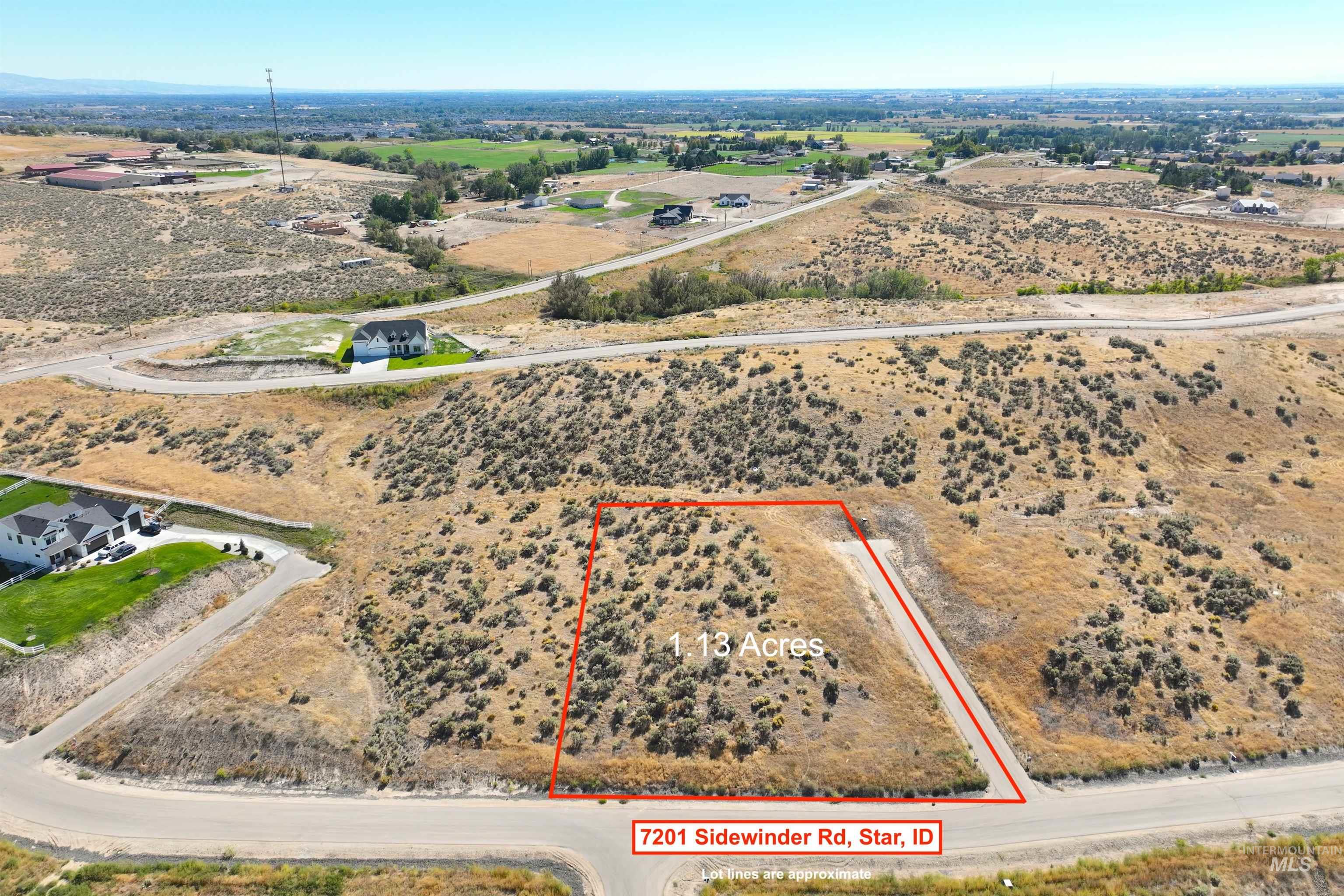 Aerial view of sparsely populated area with property boundaries highlighted