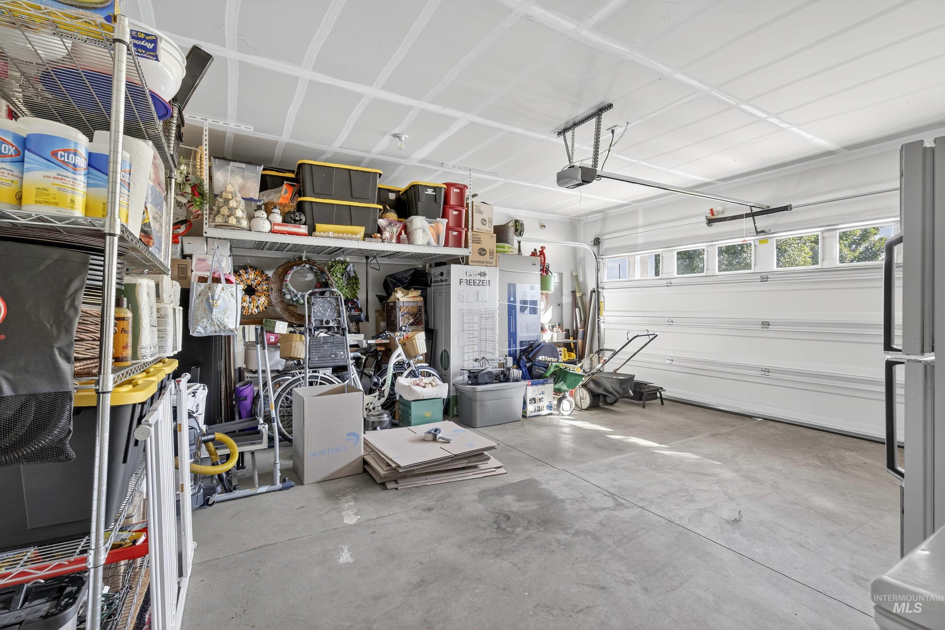 Garage with freestanding refrigerator