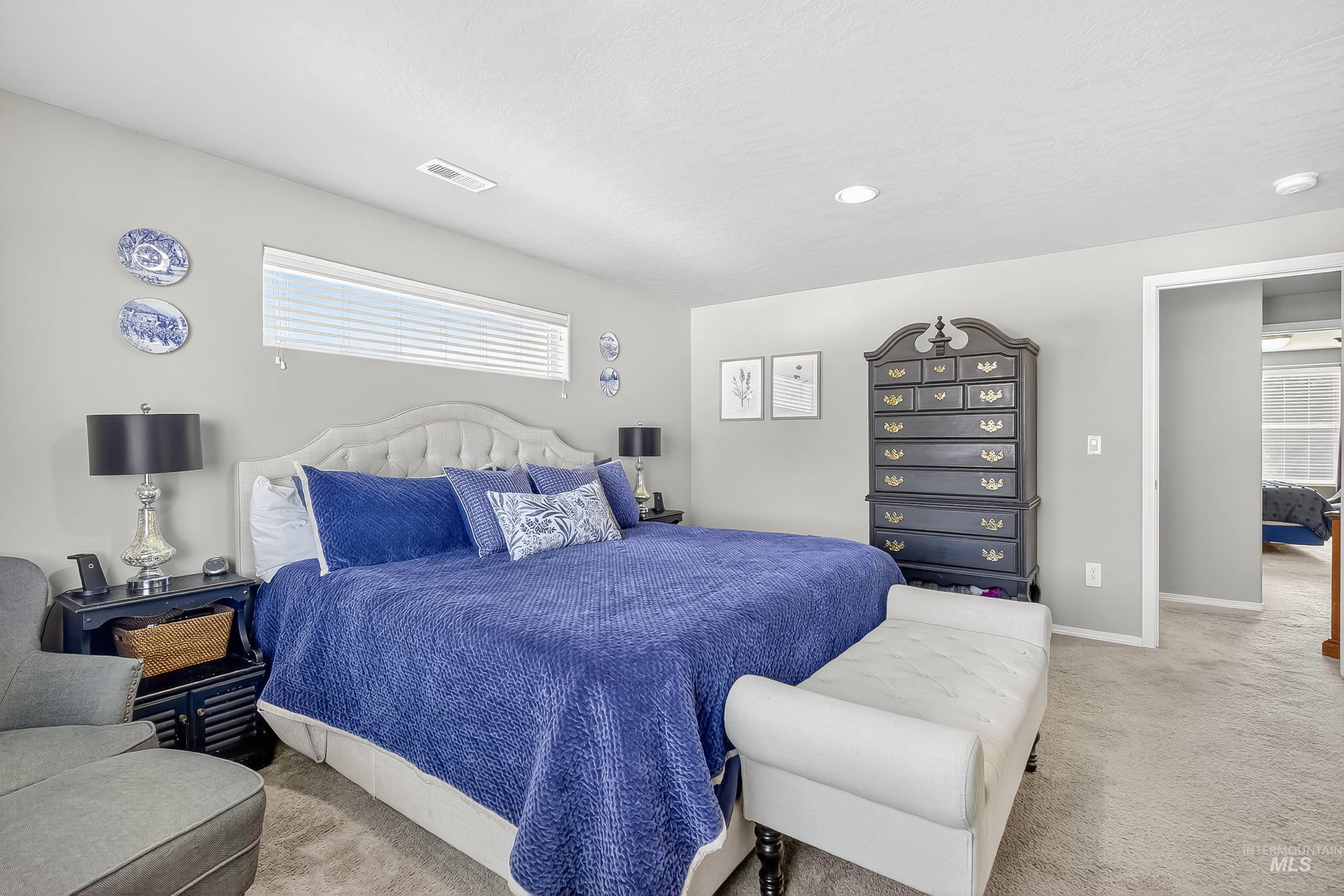 Bedroom featuring carpet flooring and recessed lighting