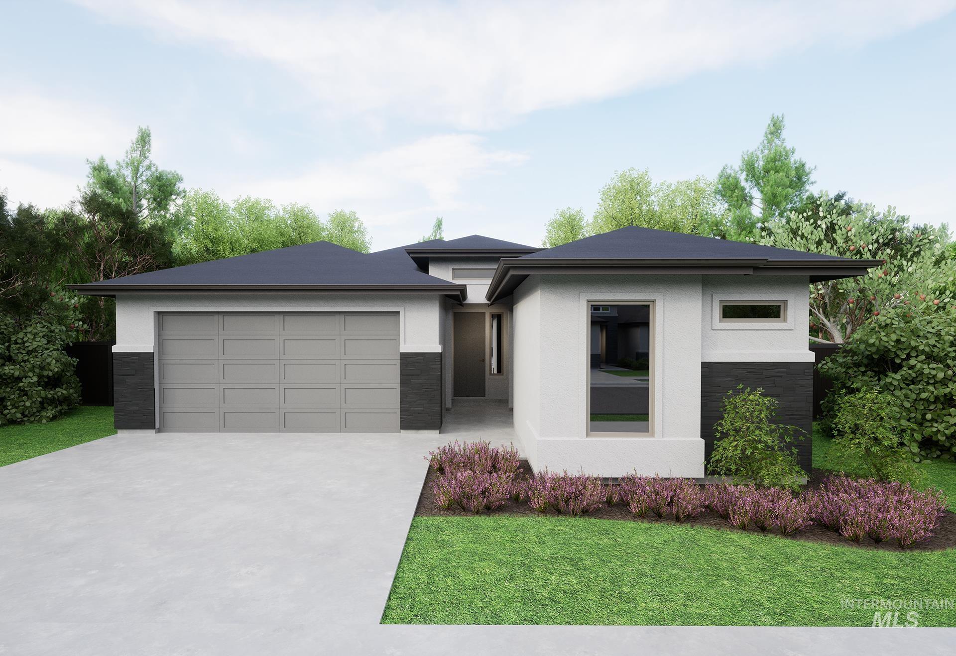 Prairie-style house featuring stucco siding, stone siding, concrete driveway, and a front lawn