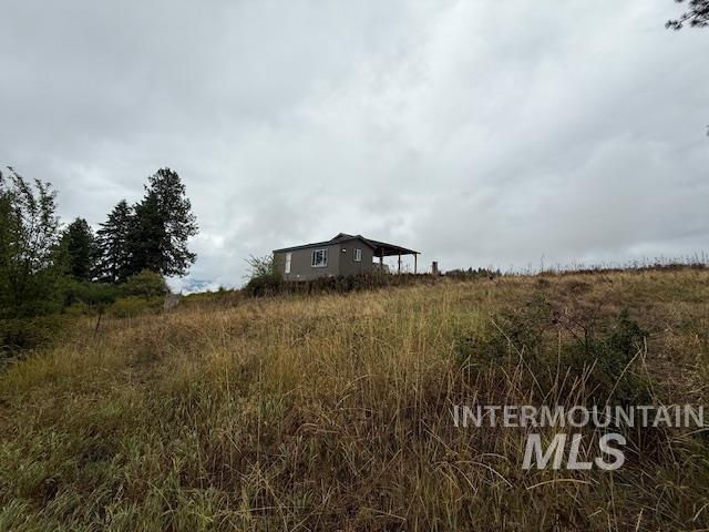 View of yard with a view of rural / pastoral area