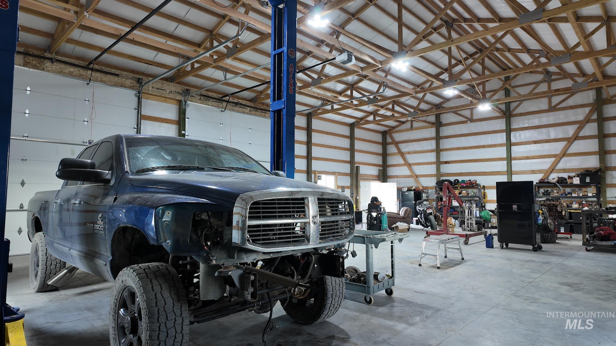 Garage featuring metal wall