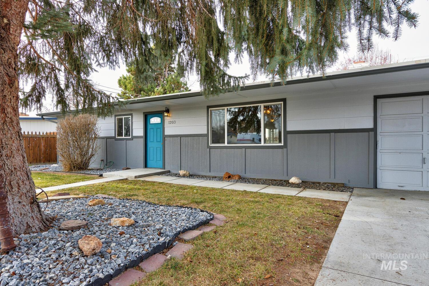 Ranch-style home with a garage