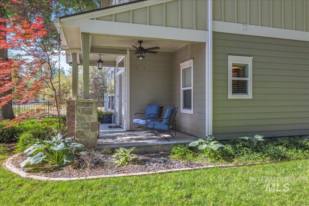 View of patio featuring a ceiling fan