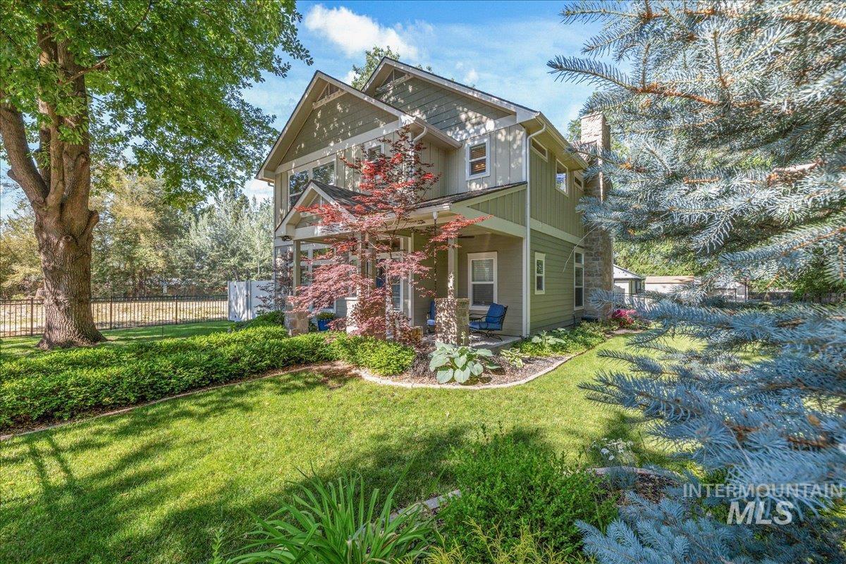 View of front of house featuring a chimney