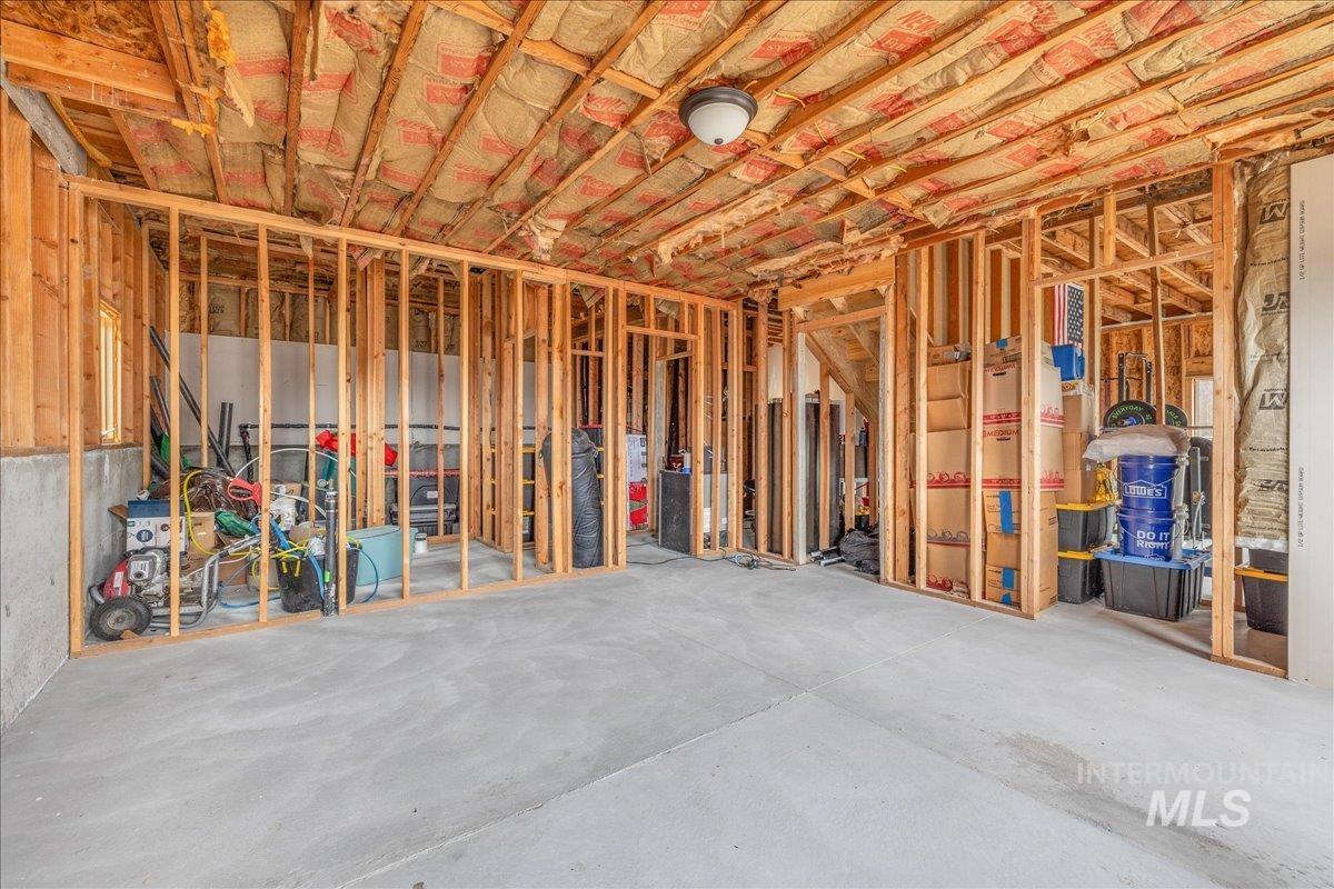 Miscellaneous room featuring concrete flooring