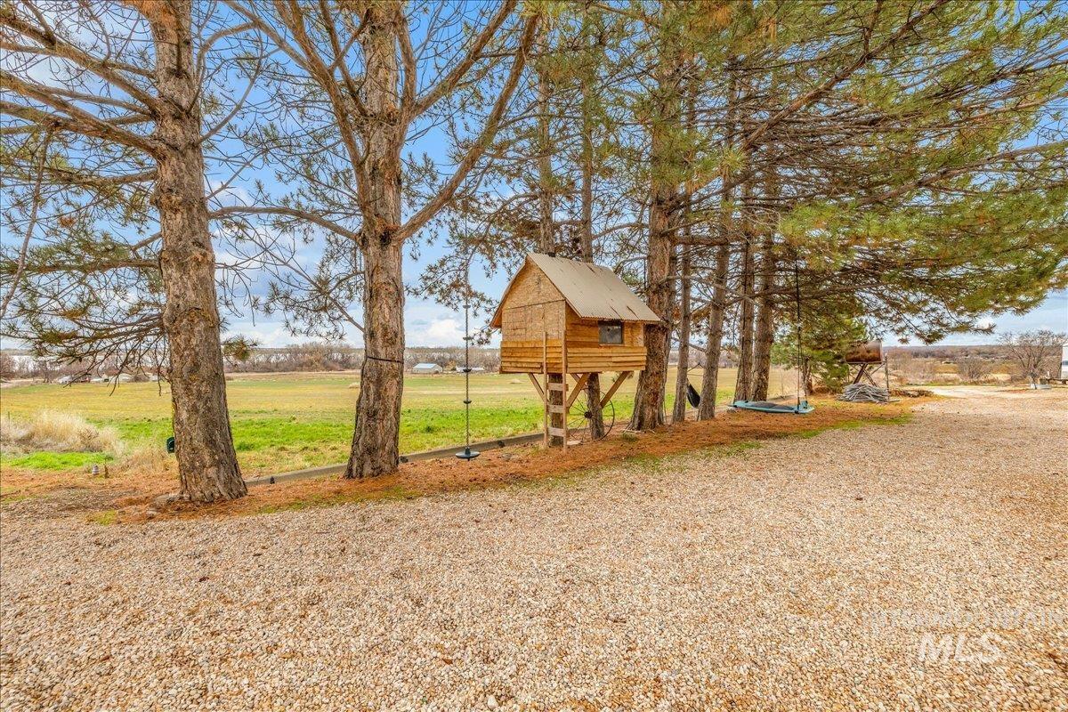 View of yard with an outdoor structure
