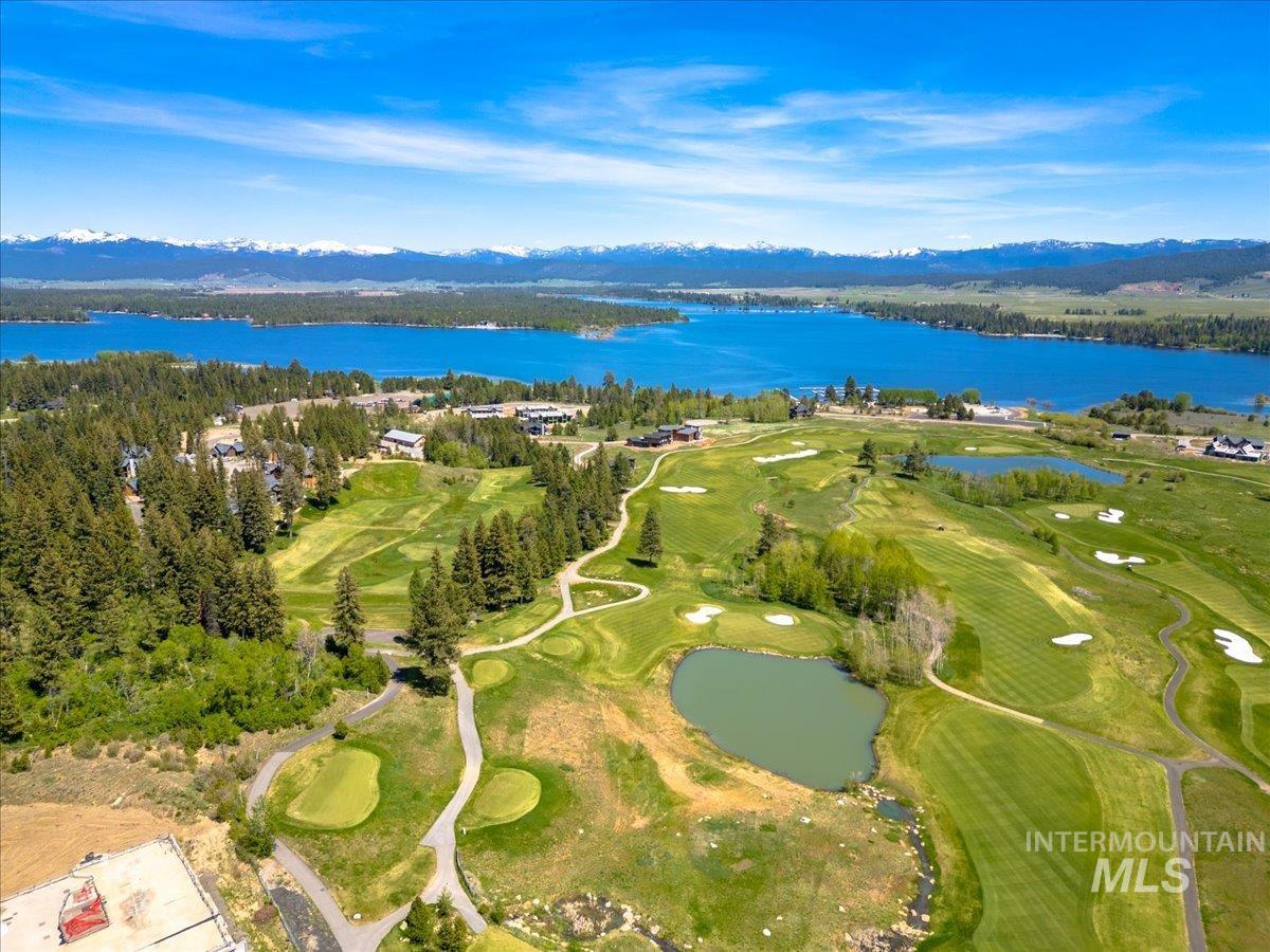 Expansive golf course setting featuring manicured fairways and greens
