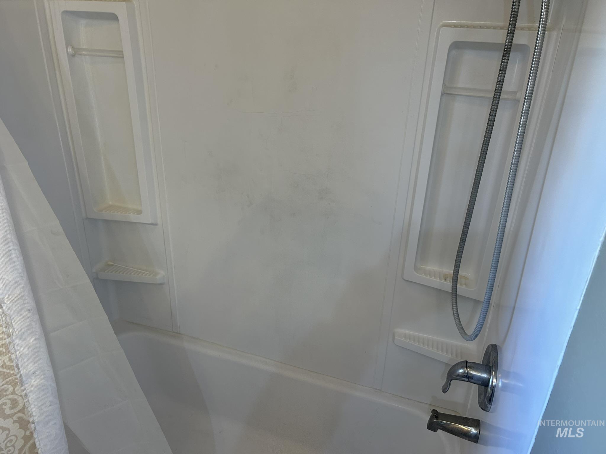 Bathroom with shower / tub combo