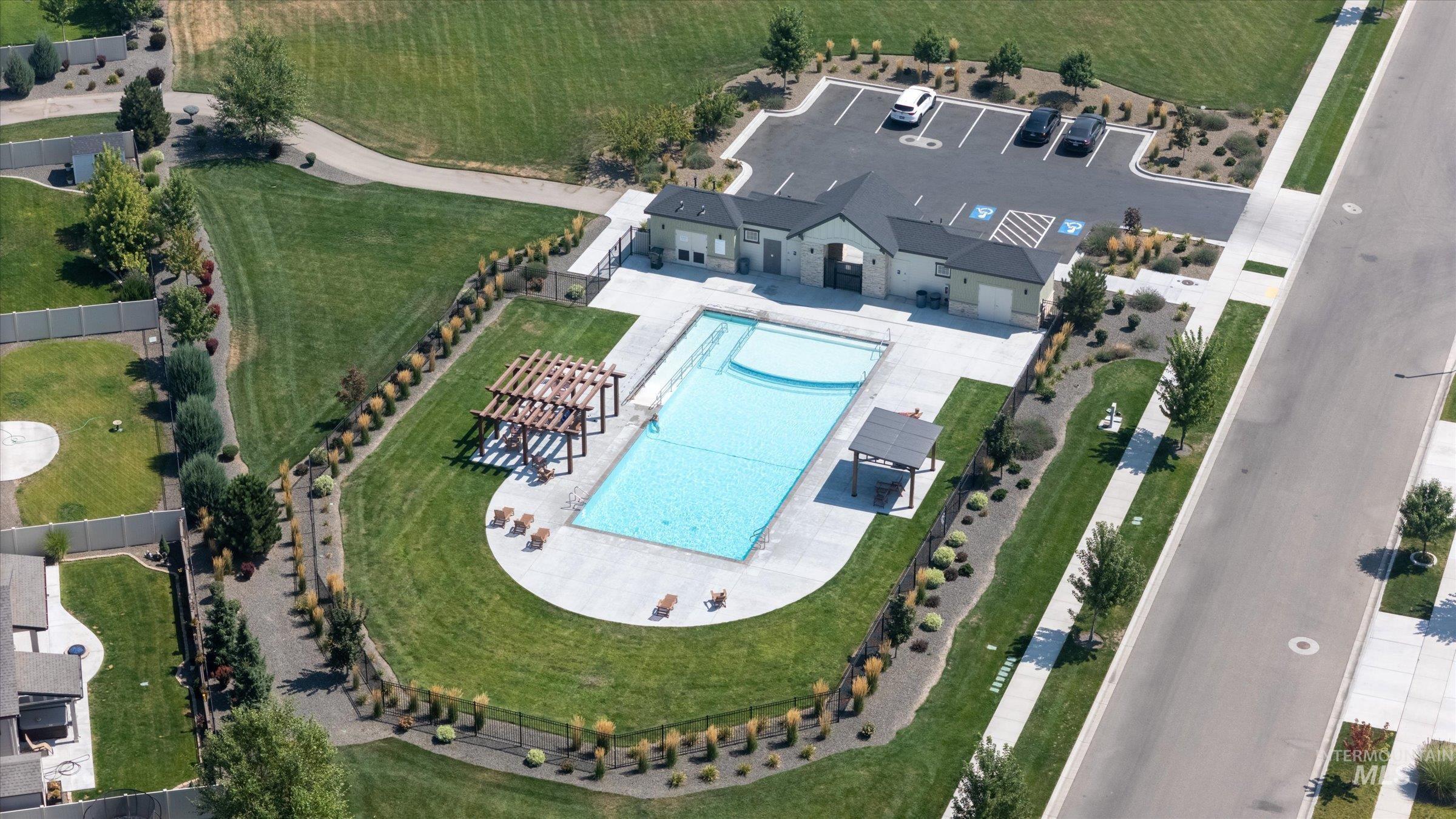 View of property location with a pool area