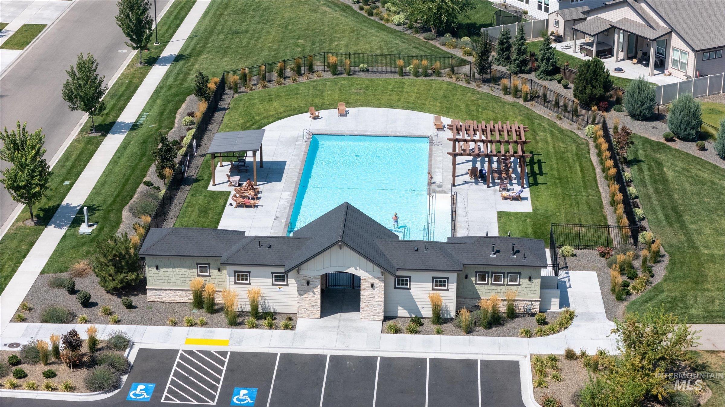 View from above of property featuring a pool area