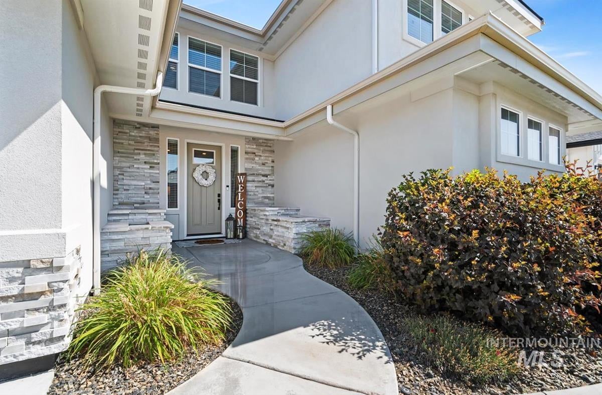 Stucco exterior with stacked stone accents