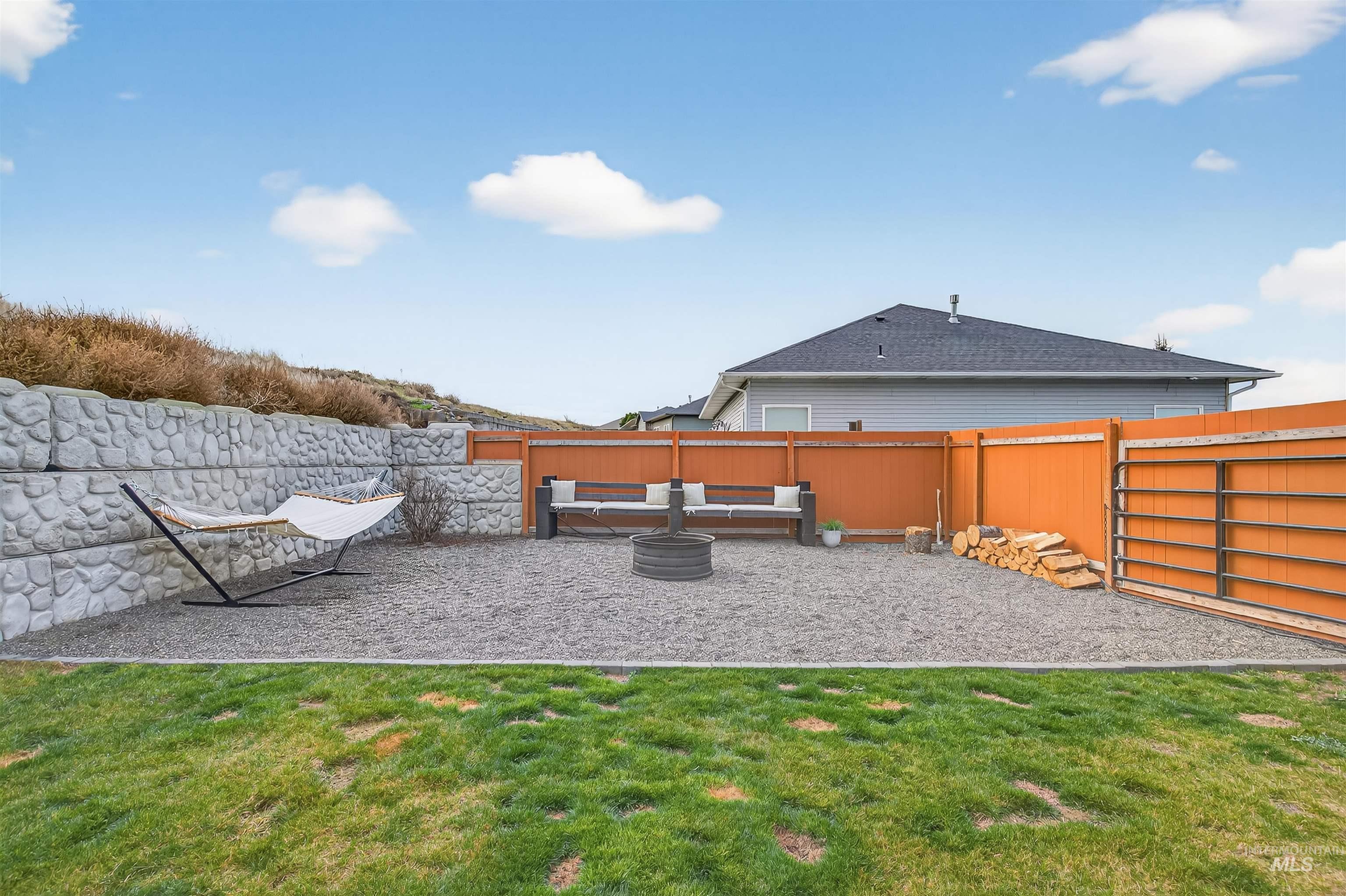 View of fenced backyard