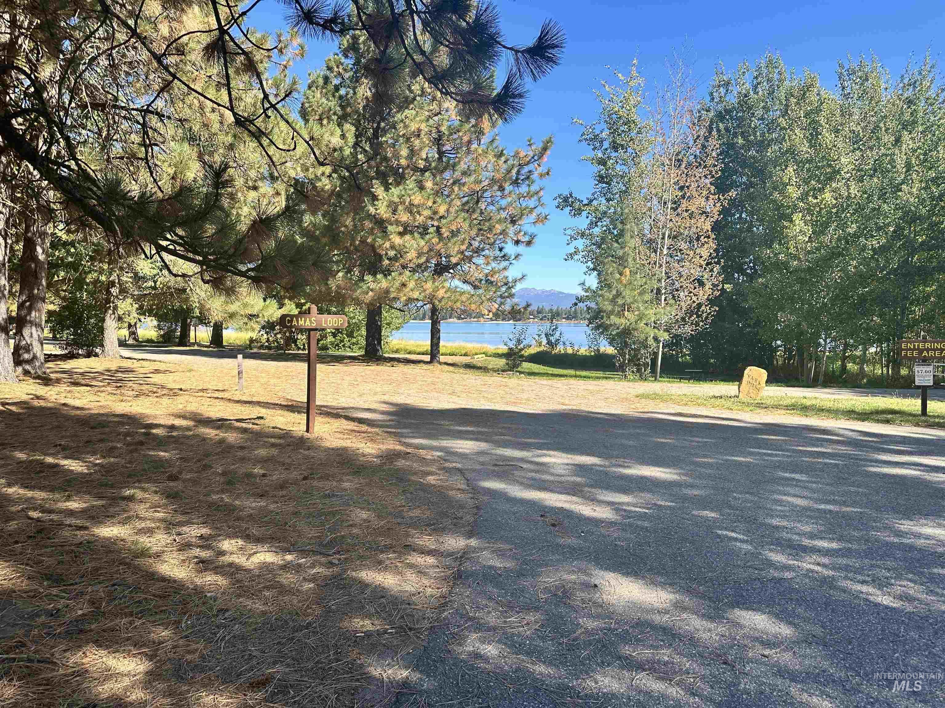 This is Directly Across the street from the Neighborhood with white sandy beaches on Lake Cascade & Access to a boat ramp.