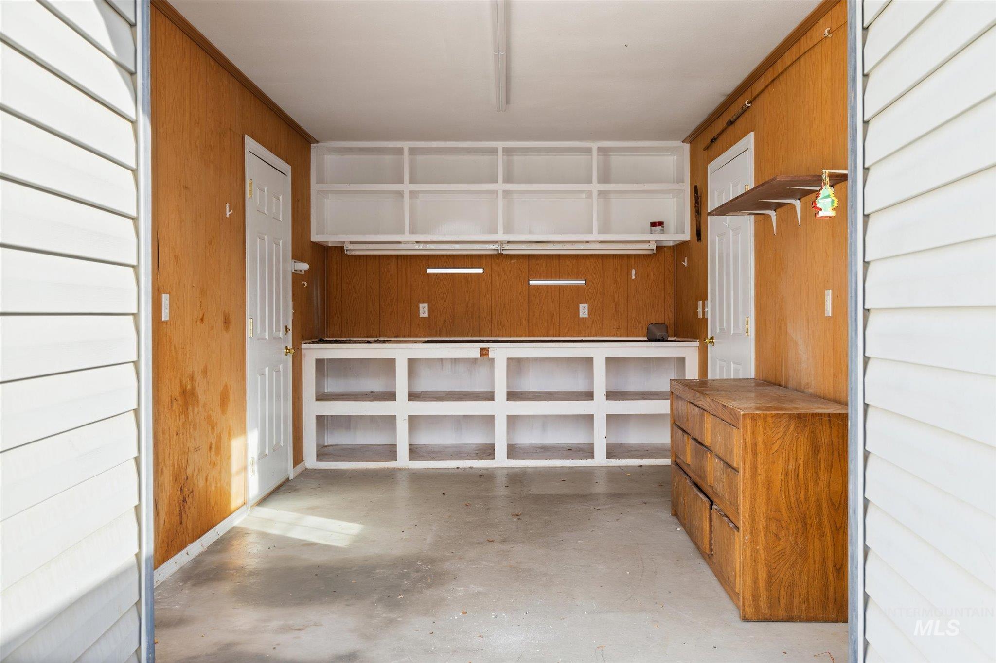 Garage with wooden walls