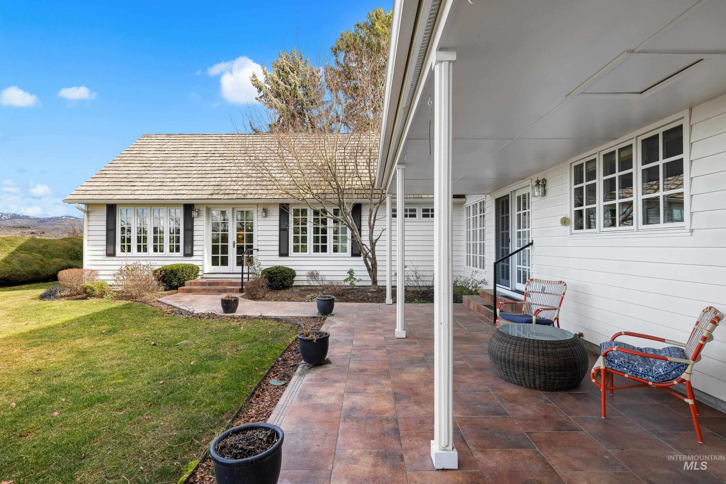 View of patio featuring french doors and entry steps