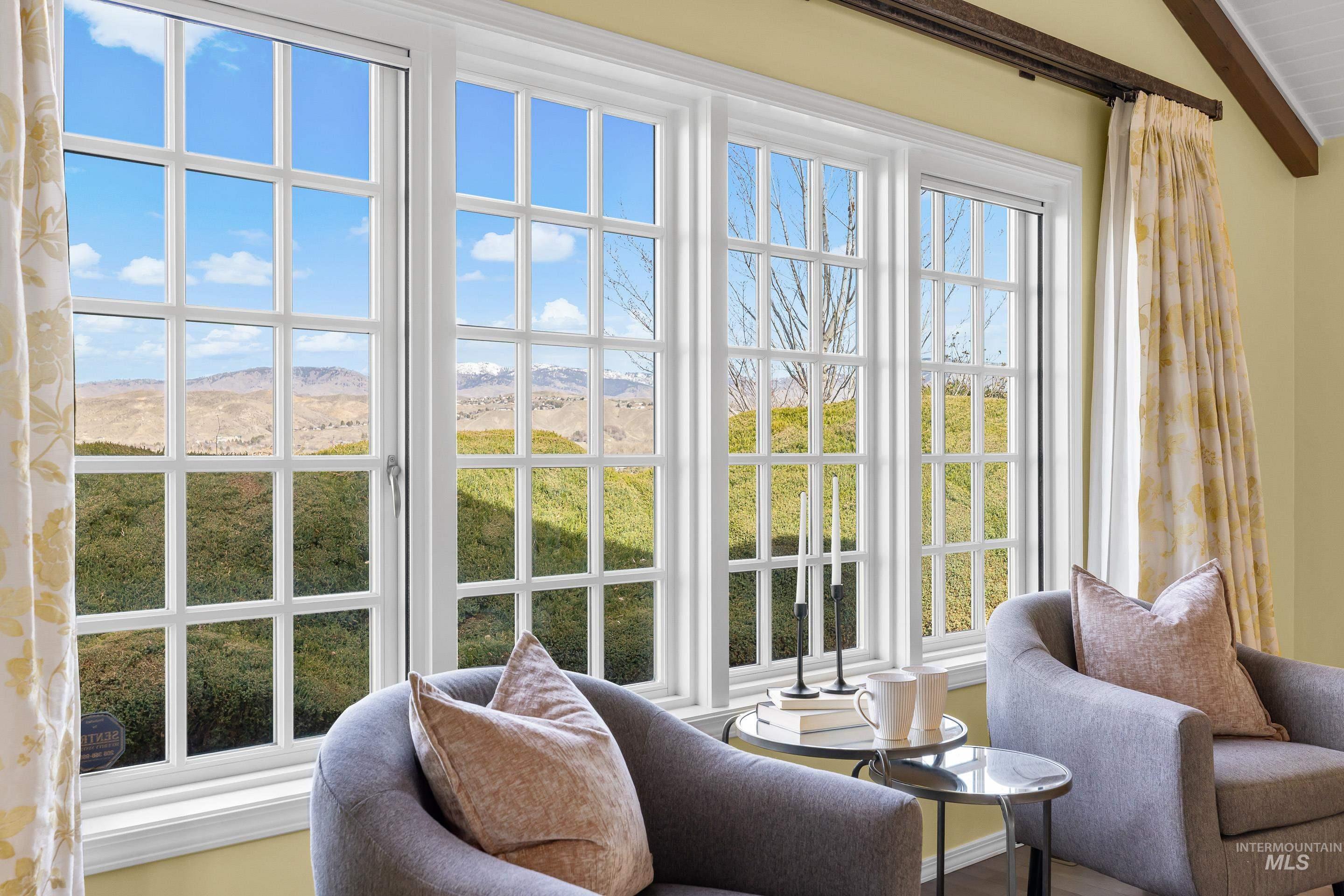 Doorway featuring wood finished floors and a mountain view