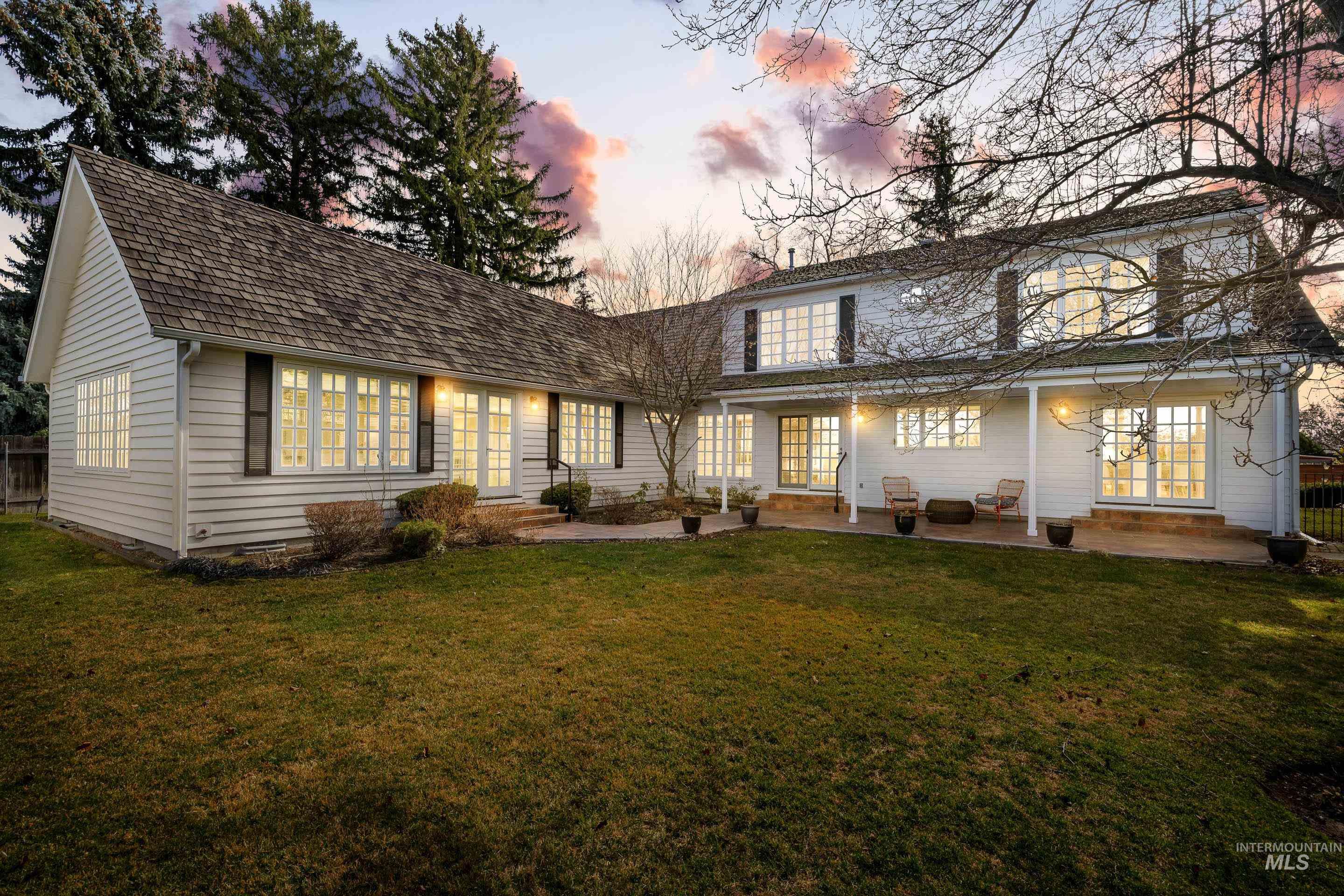 Rear view of property with a patio and french doors