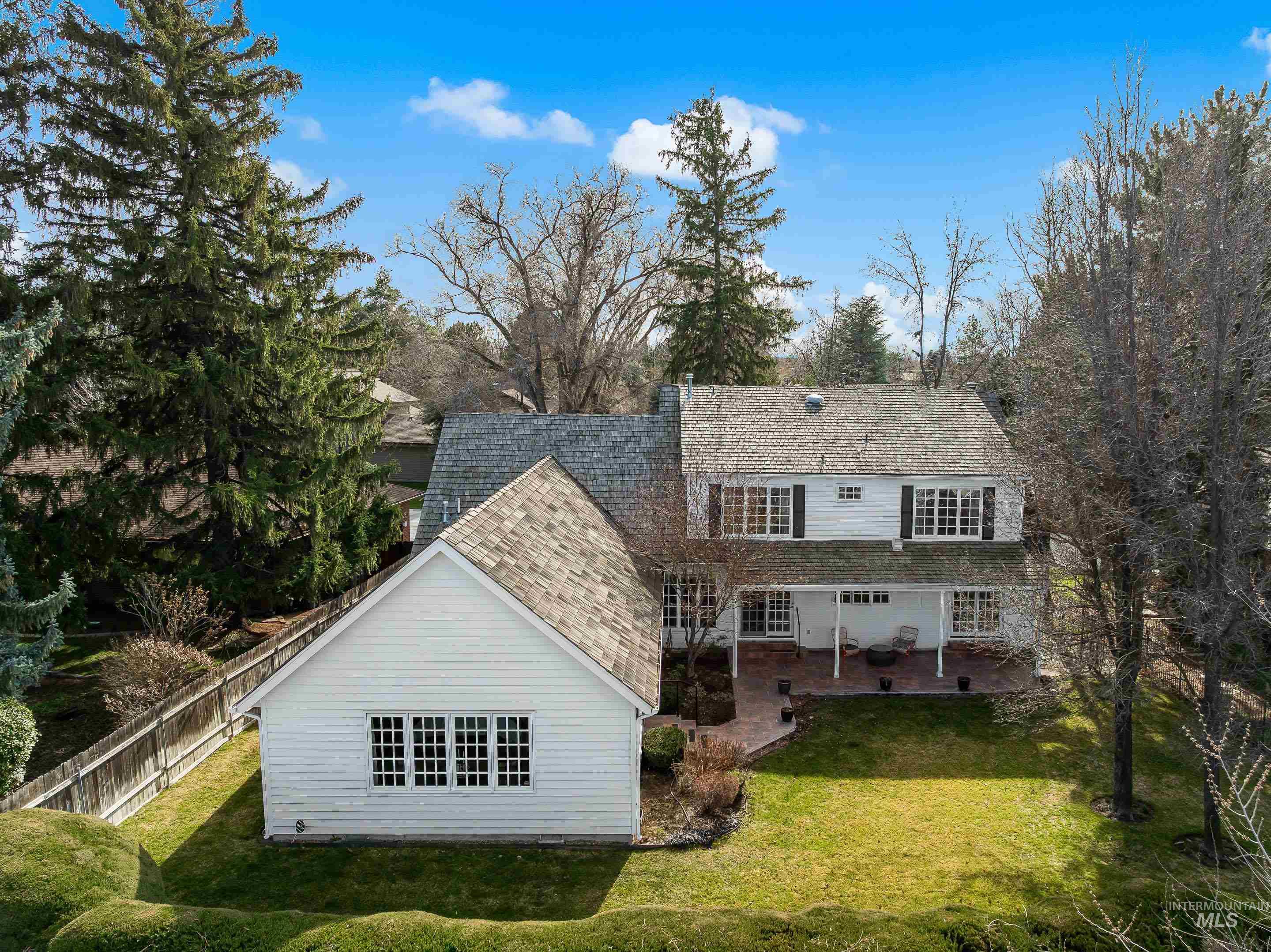 Rear view of property with a patio area