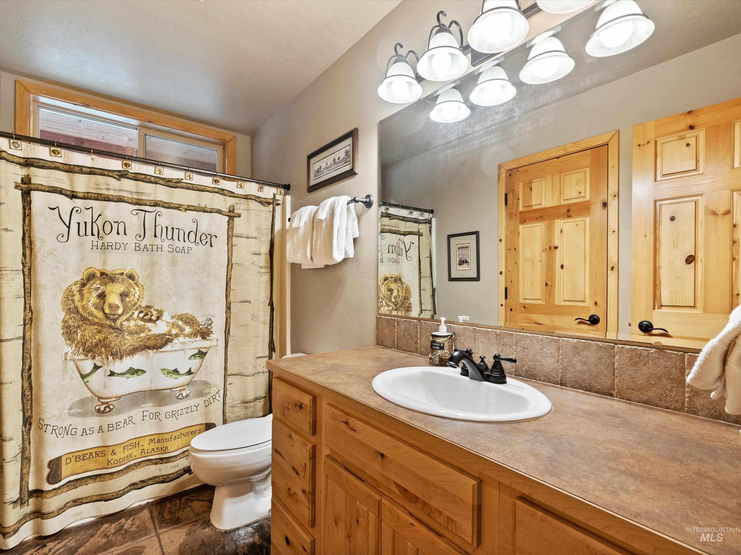 Bathroom with vanity and a shower with curtain