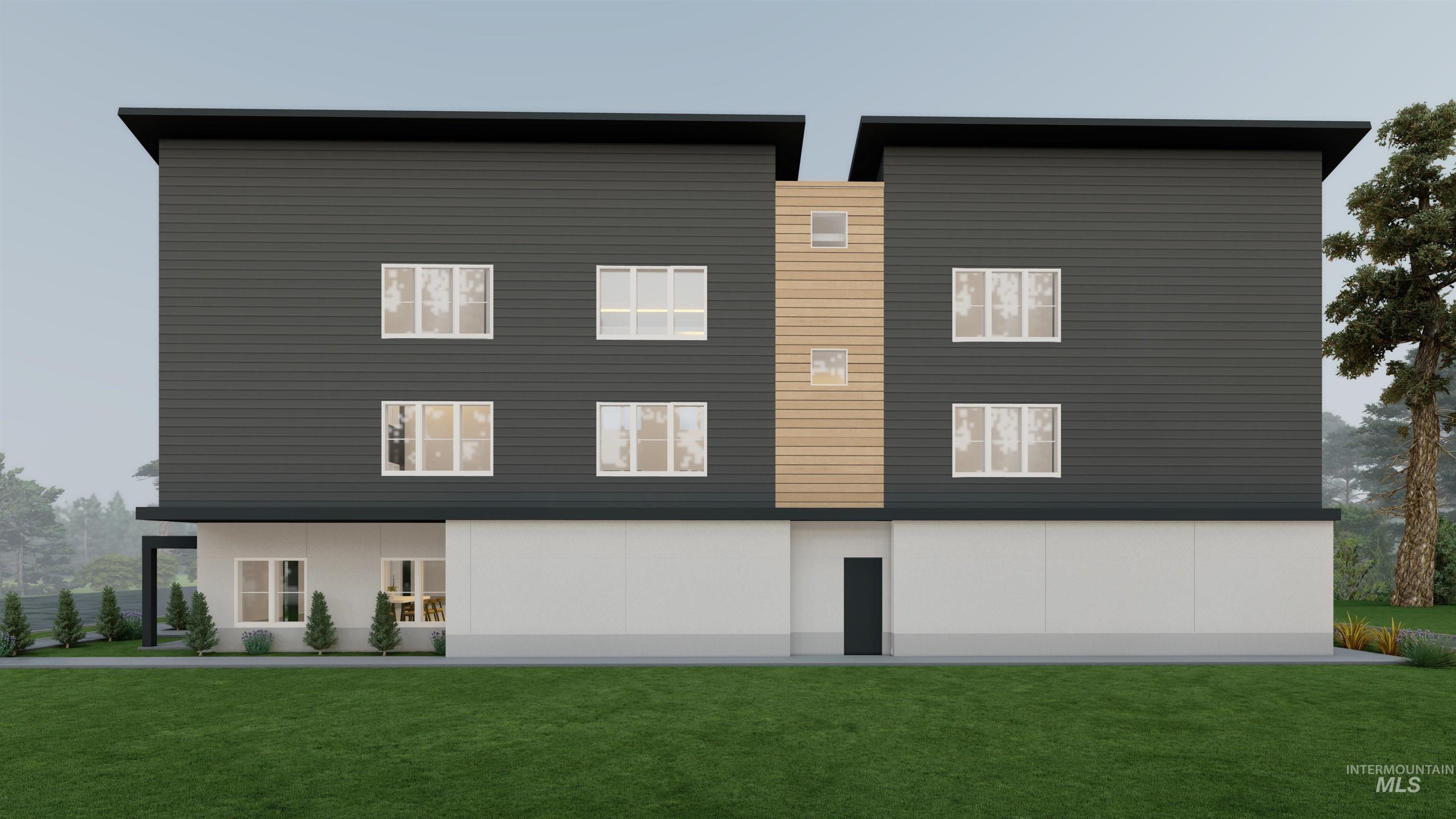 Back of house with a yard