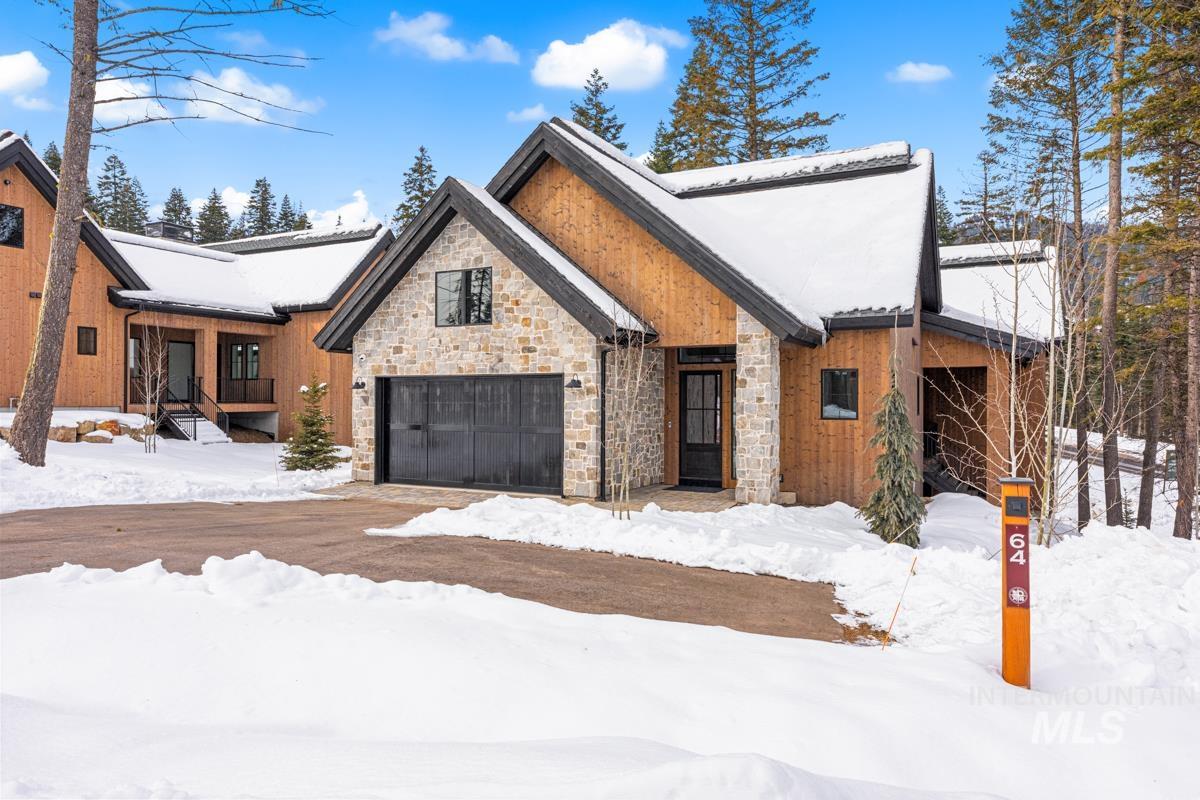View of front facade with stone siding
