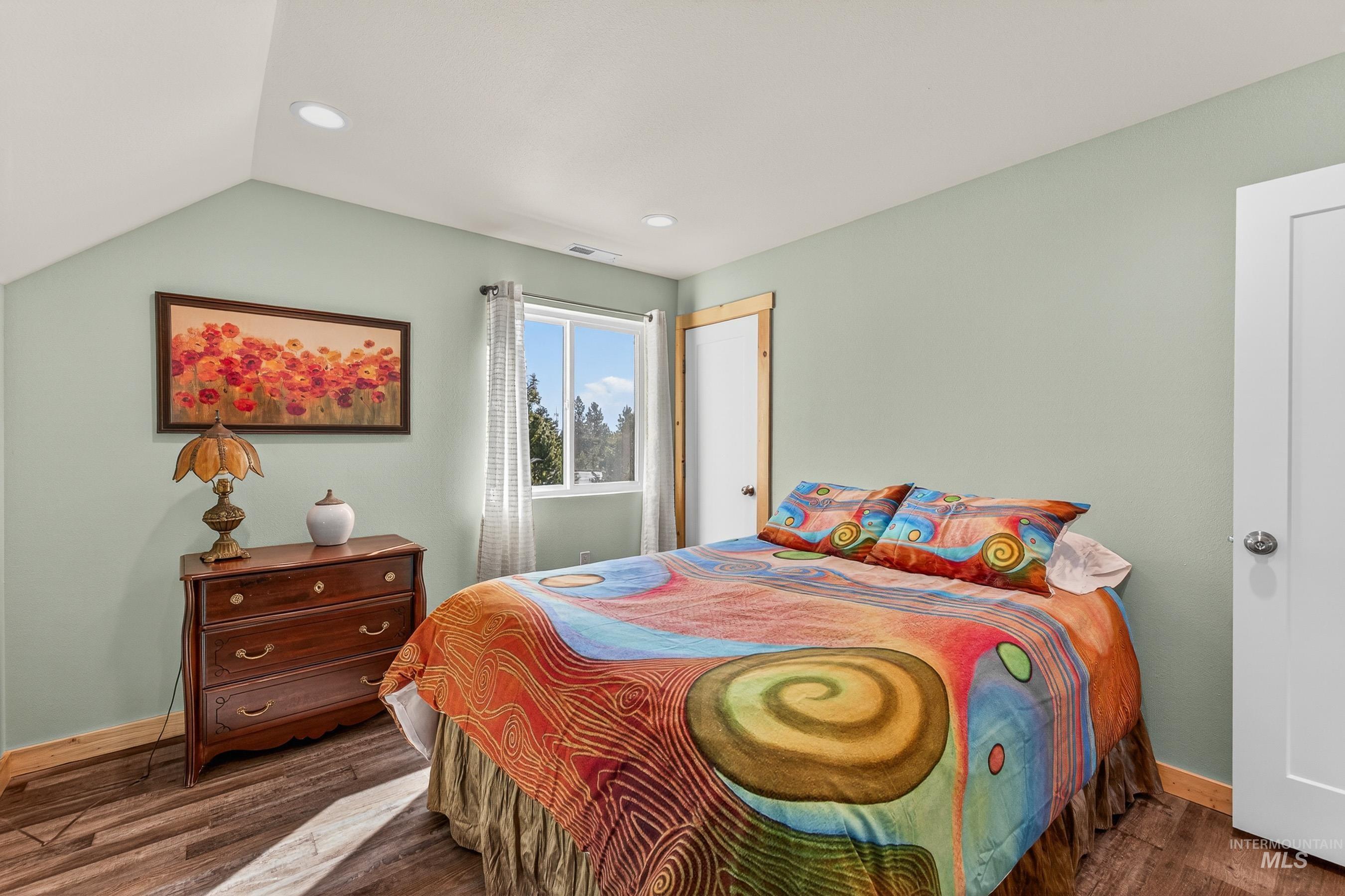 Vaulted ceilings and large closet and nook under the eaves.