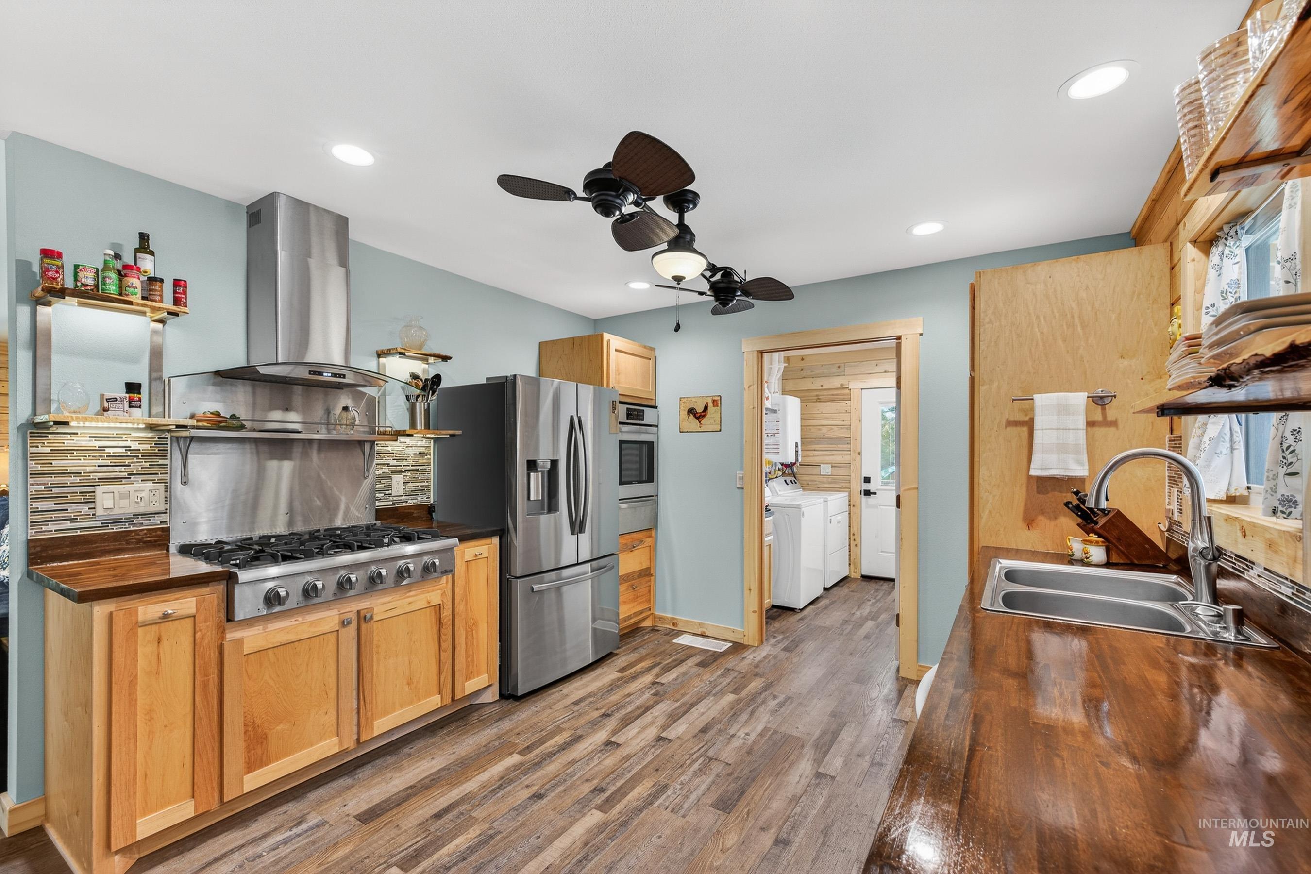 Butcher block counters, stainless appliances.