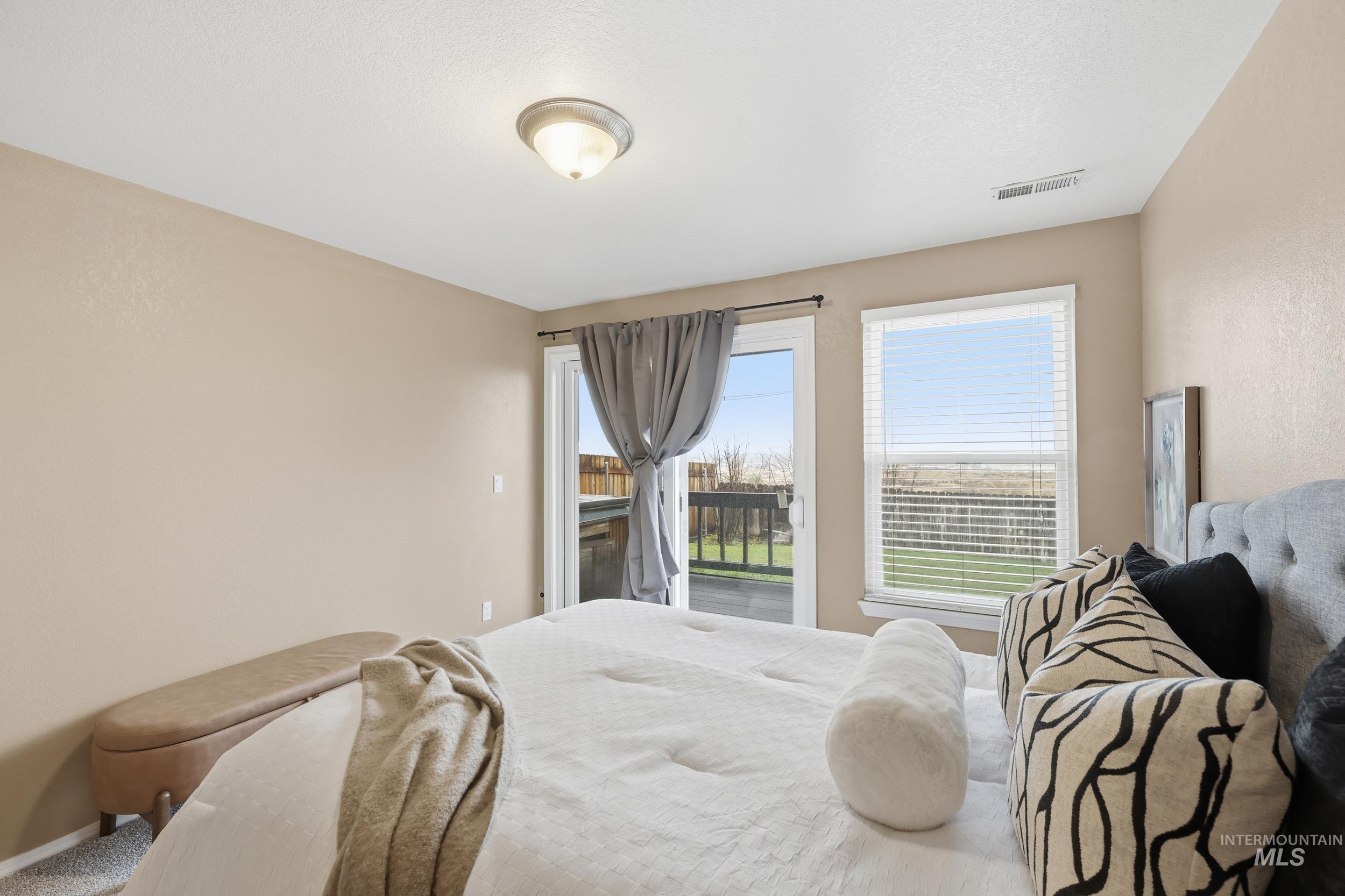 Bedroom featuring access to exterior