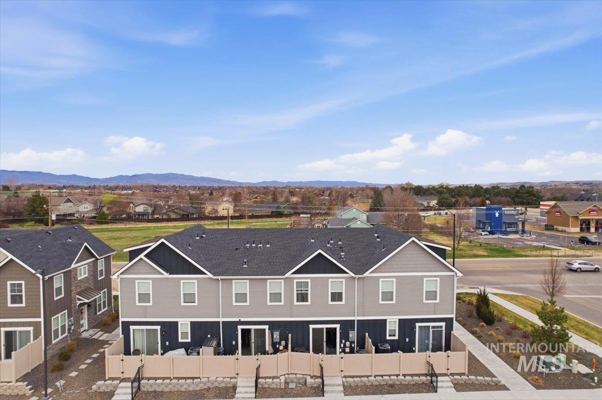Aerial view of residential area with mountains