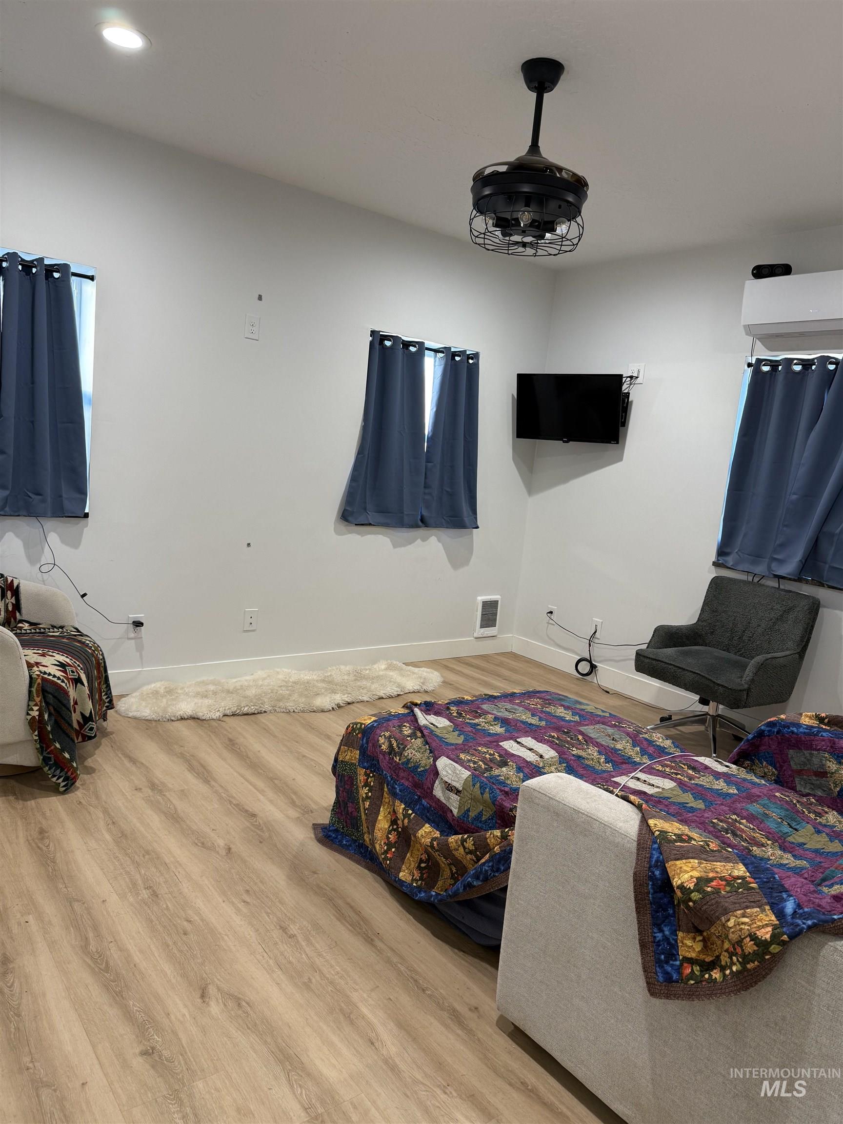 Bedroom/living room with LVP floors