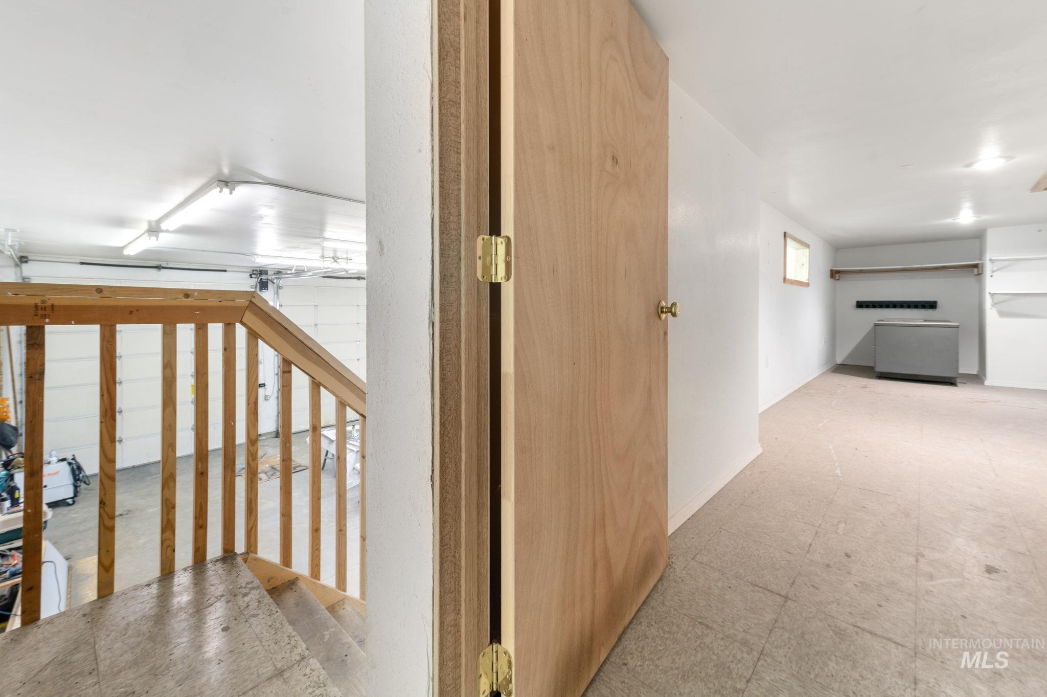 Hall with tile patterned floors